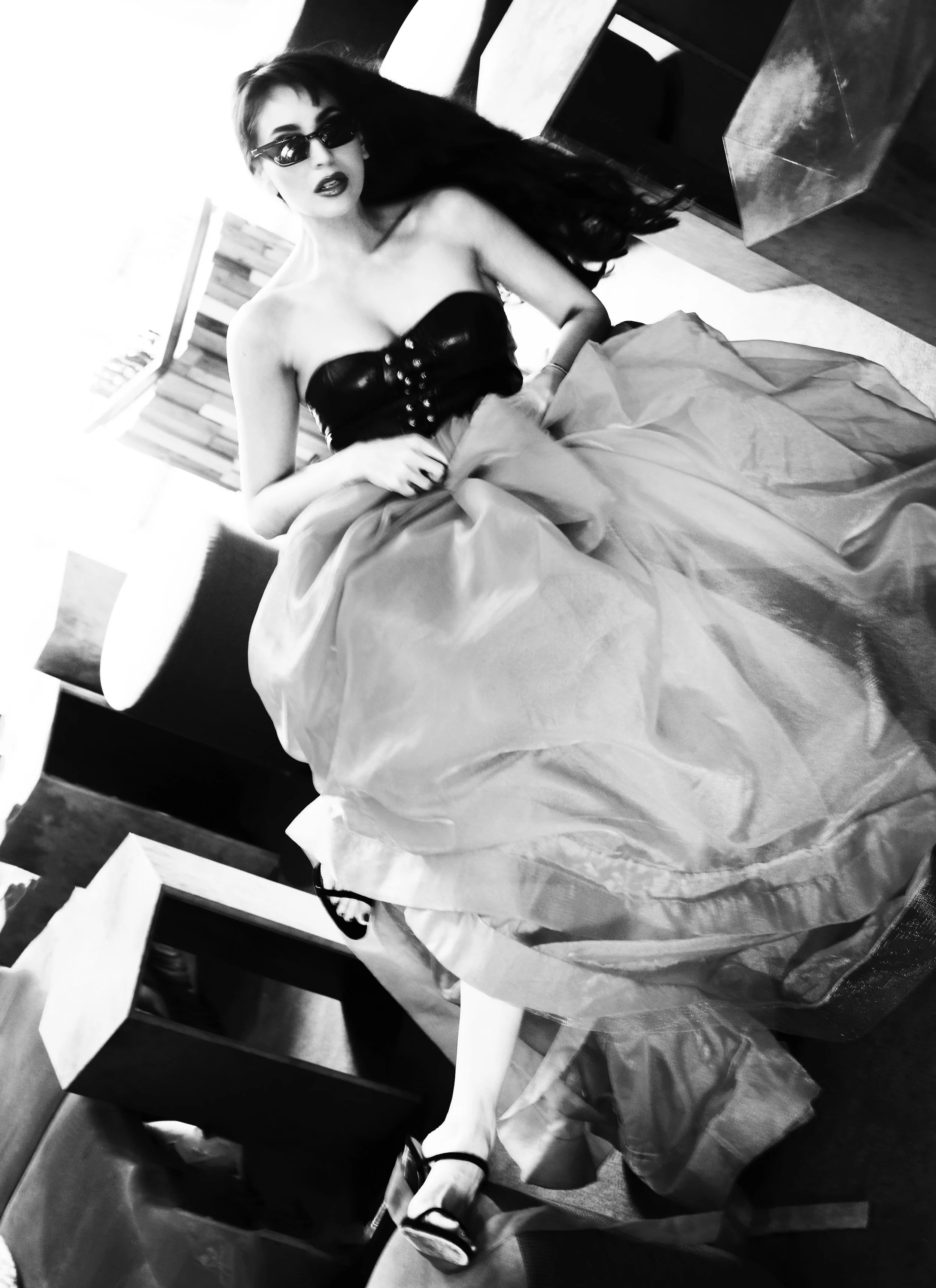 Bustier: Versace Skirt: No21 Heels: Giuseppe Zanotti Sunglasses: Linda Farrow