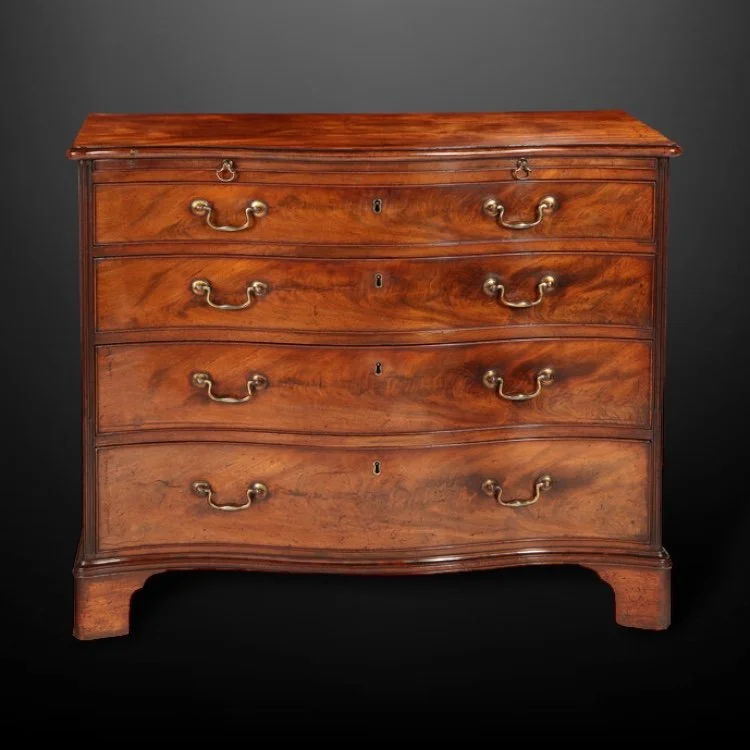 A fine George III Chippendale chest of drawers.JPG
