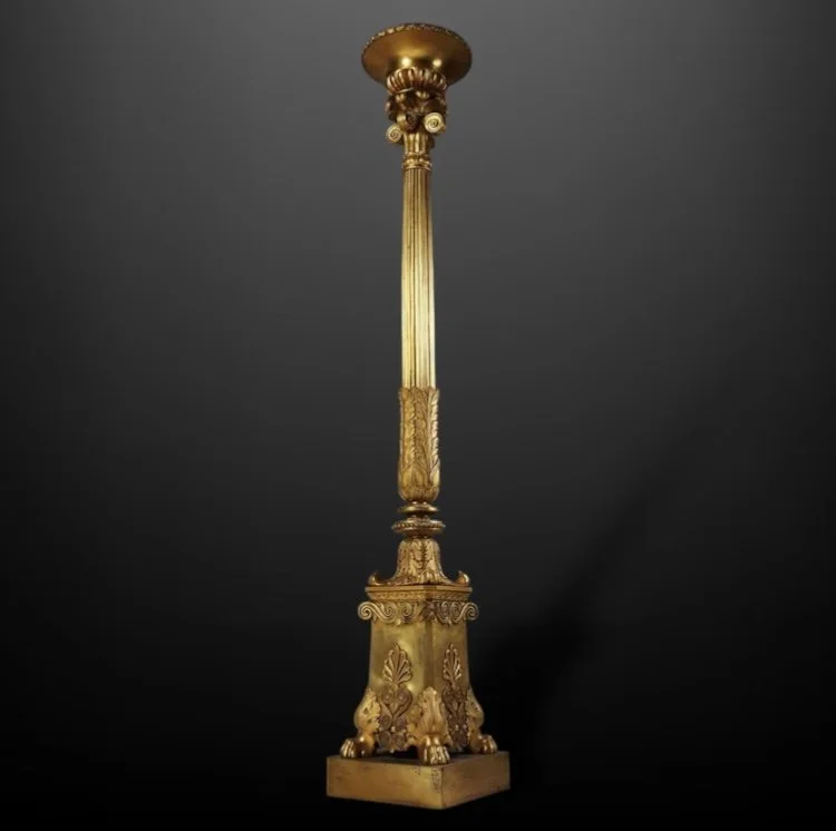 An elegant single gilt bronze torchère