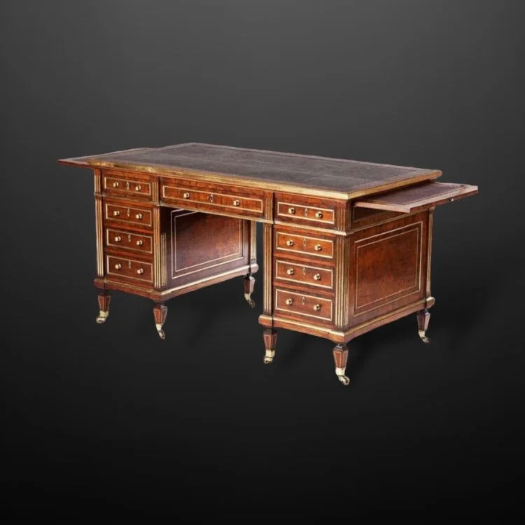 A fine 19th Century brass bound pedestal desk