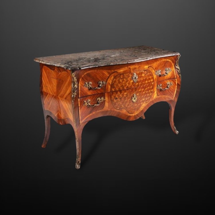 A Dutch rococo parquetry bombé commode, mid 18th Century