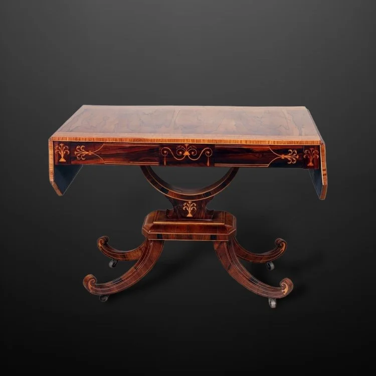 A George III rosewood, satinwood and kingwood sofa table