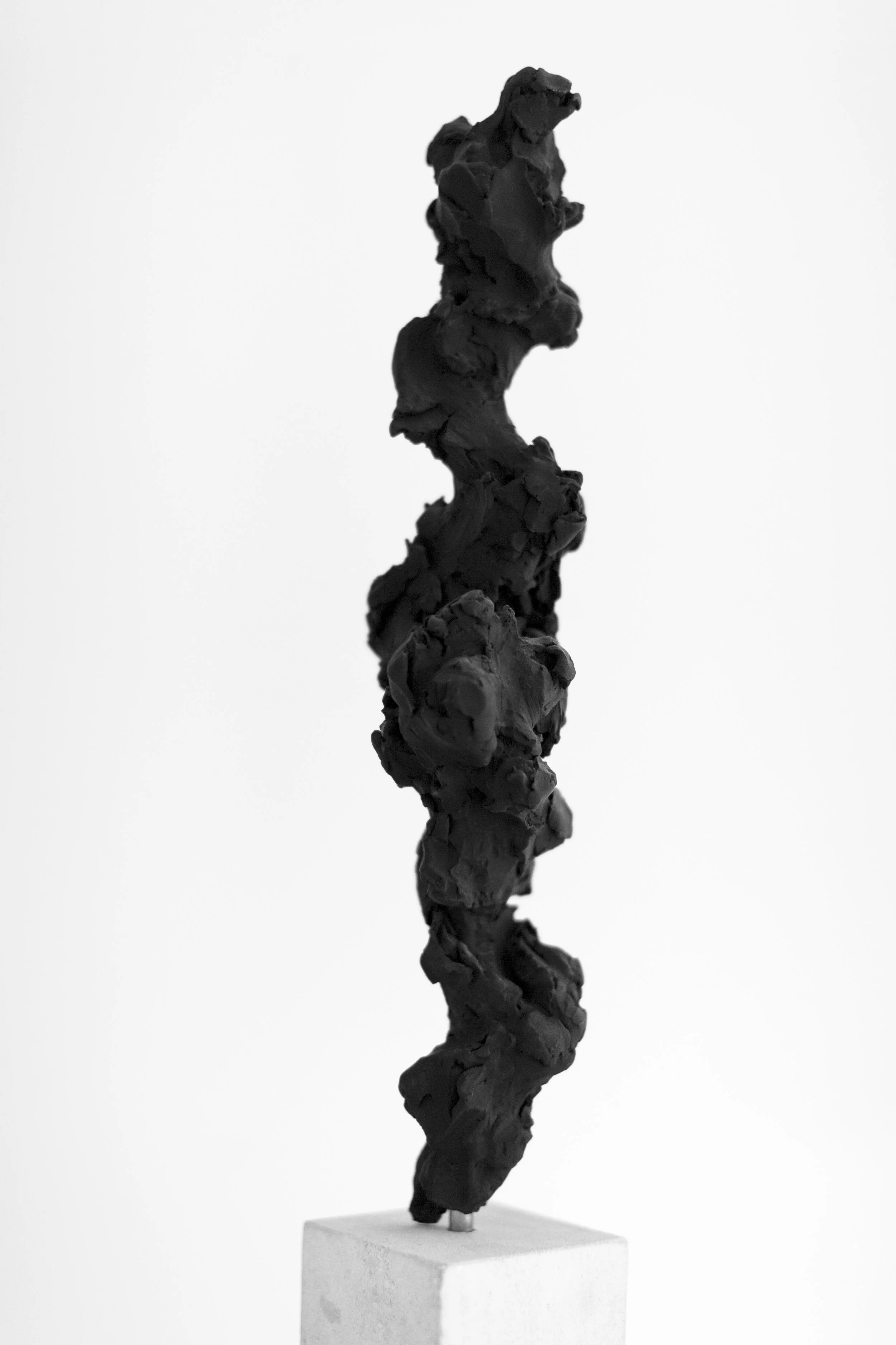 Black Totem No.3, 2017 Painted bronze and portland stone, 50x10x10 cm