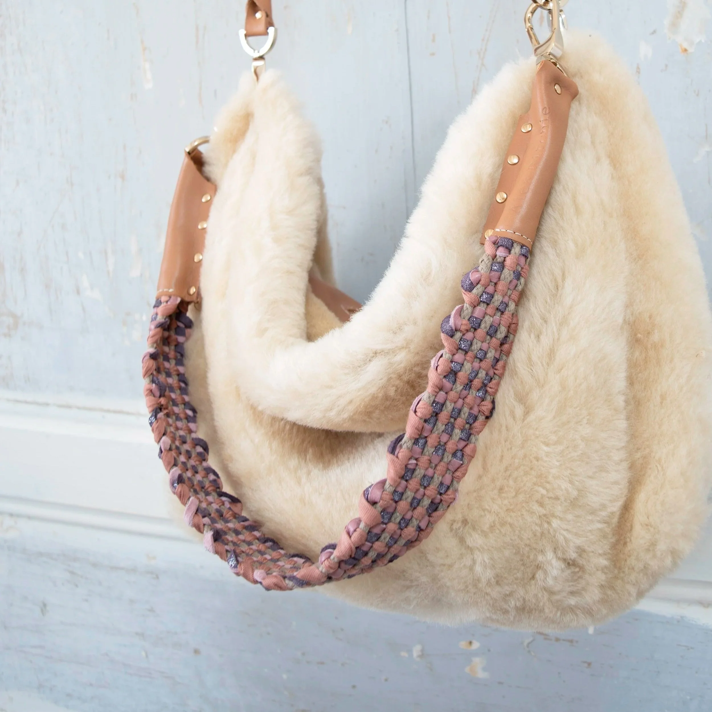 sheepskin+fluffy+soft+handbag+woven+strap.jpg