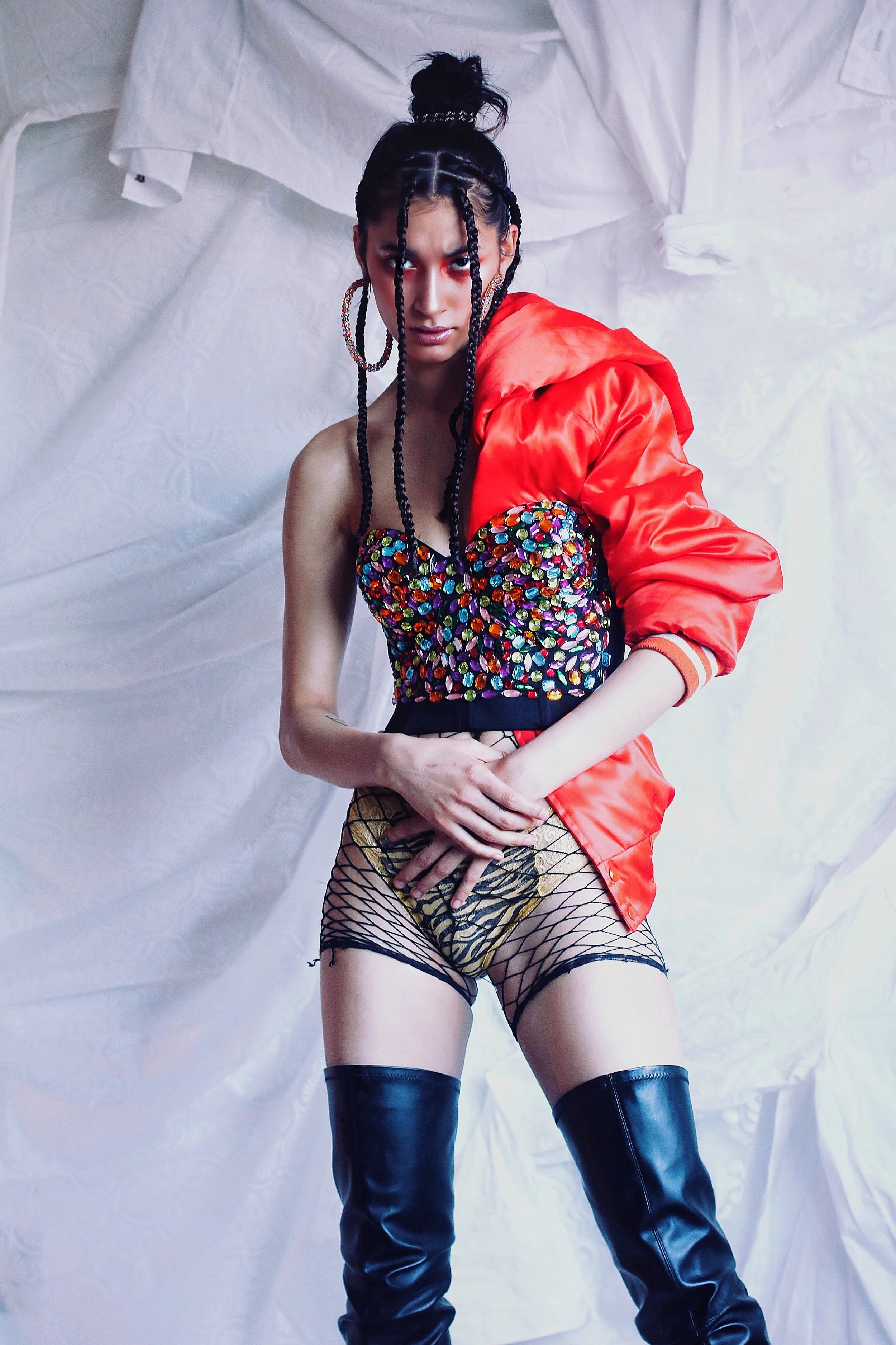 Puffer jacket: Rag and Bone. Corset: Discount Universe. Panties: Savage Fenty. Boots: Rick Owens.