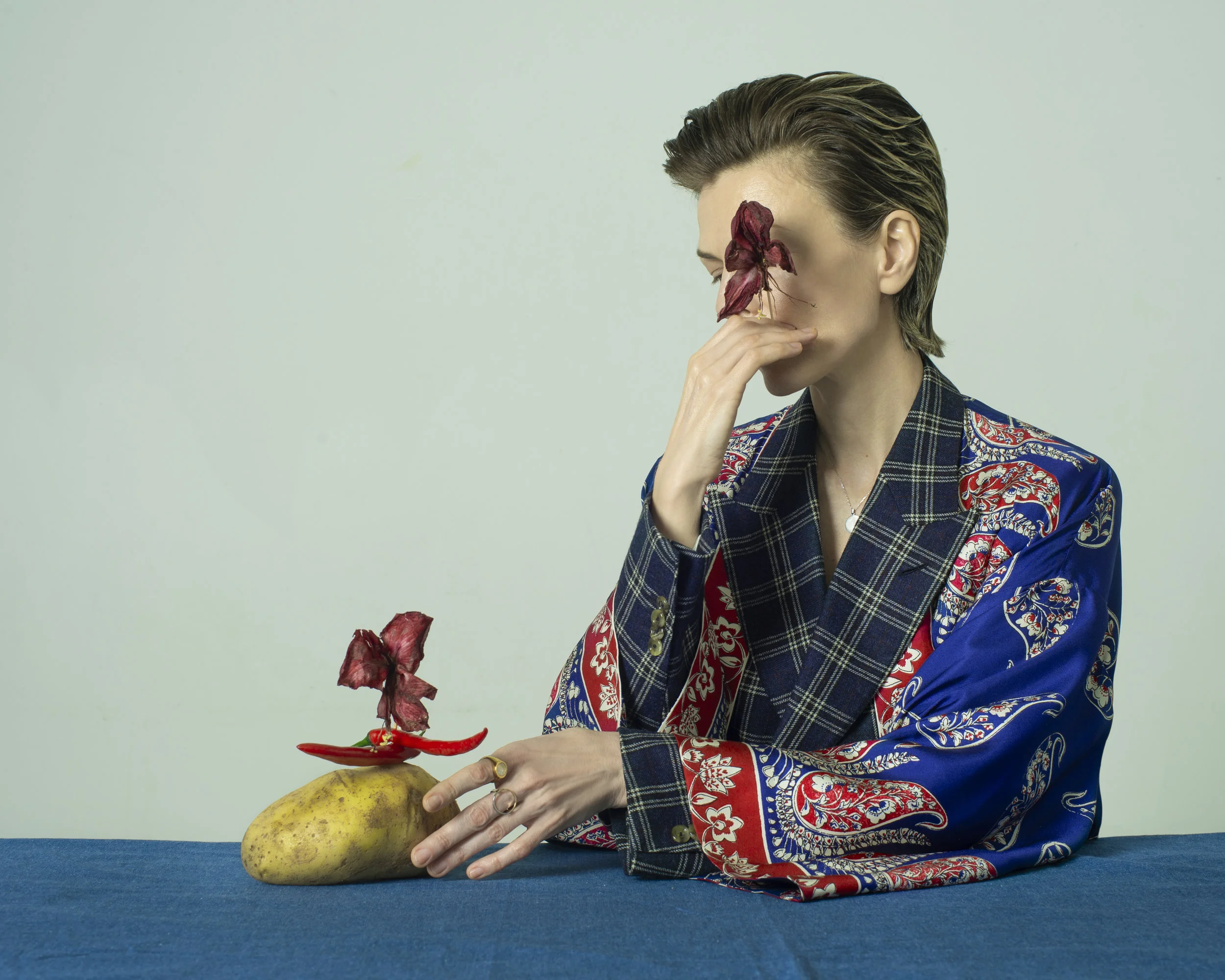 Jacket and robe, GUCCI. Necklace and ring, AVGVST. Ring MODBRAND