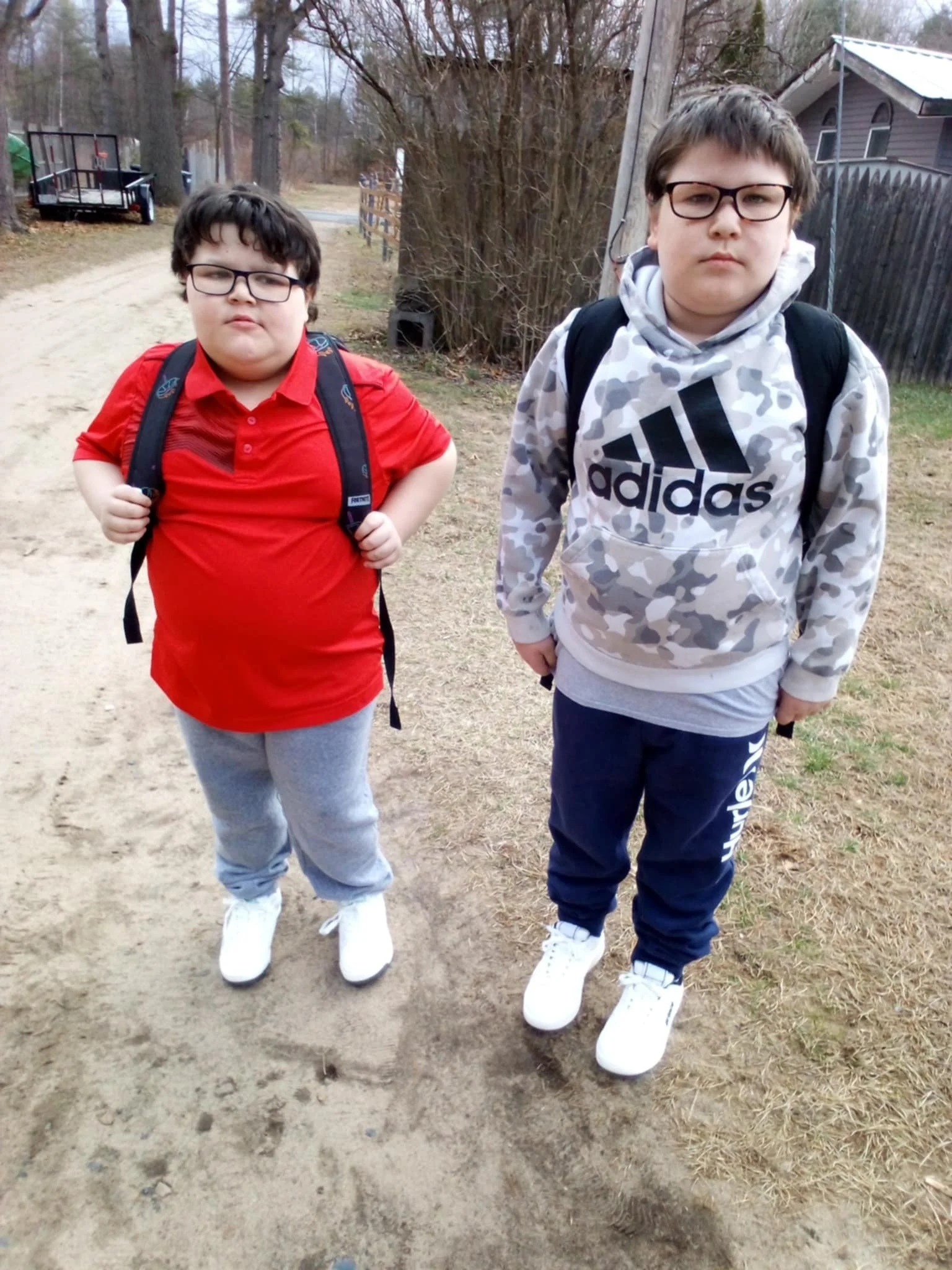 Collin and Lukas wearing shoes from Prince Sneakers donation have permission.jpg