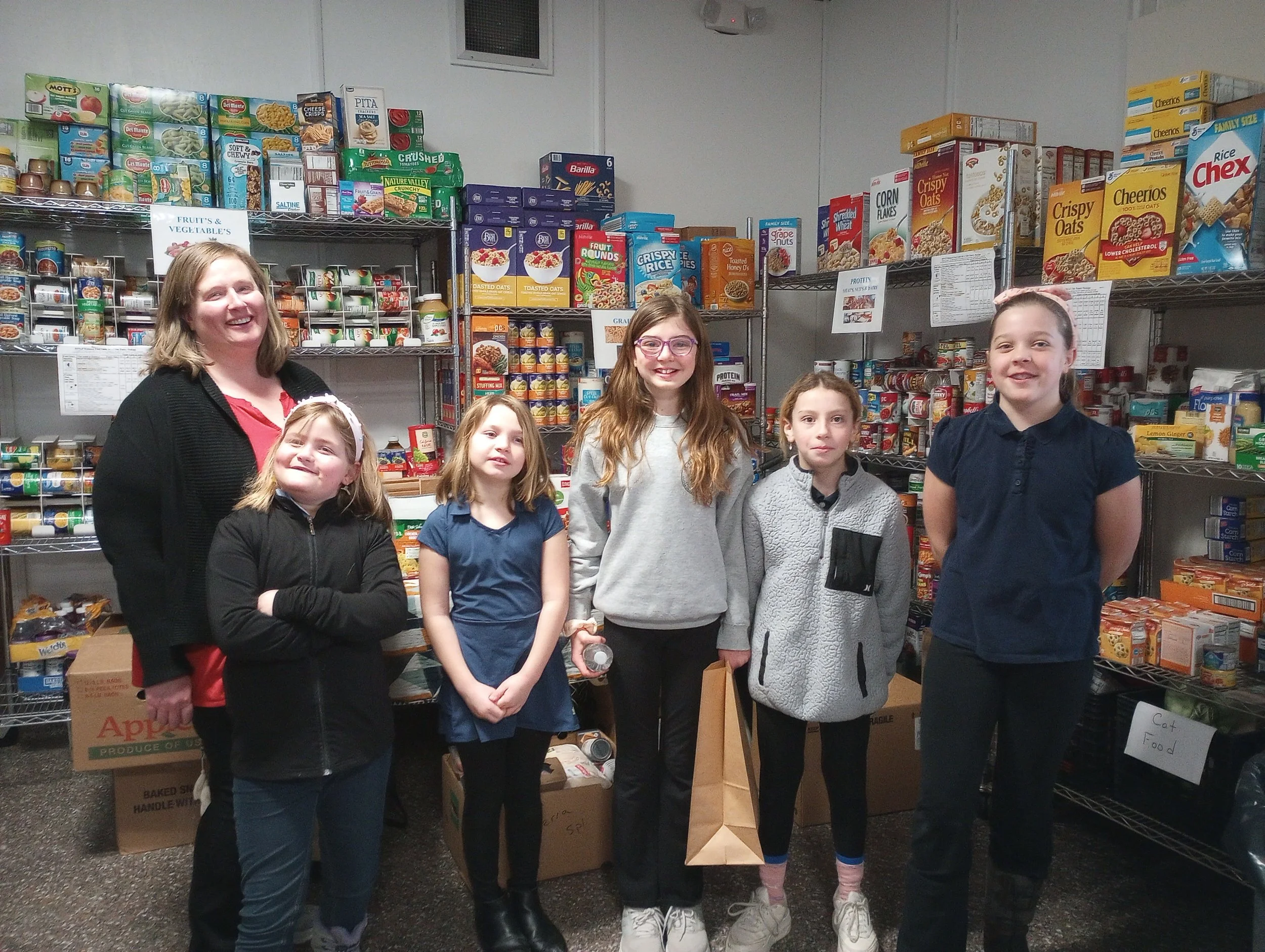 Students help stock food pantry at Saranac Lake