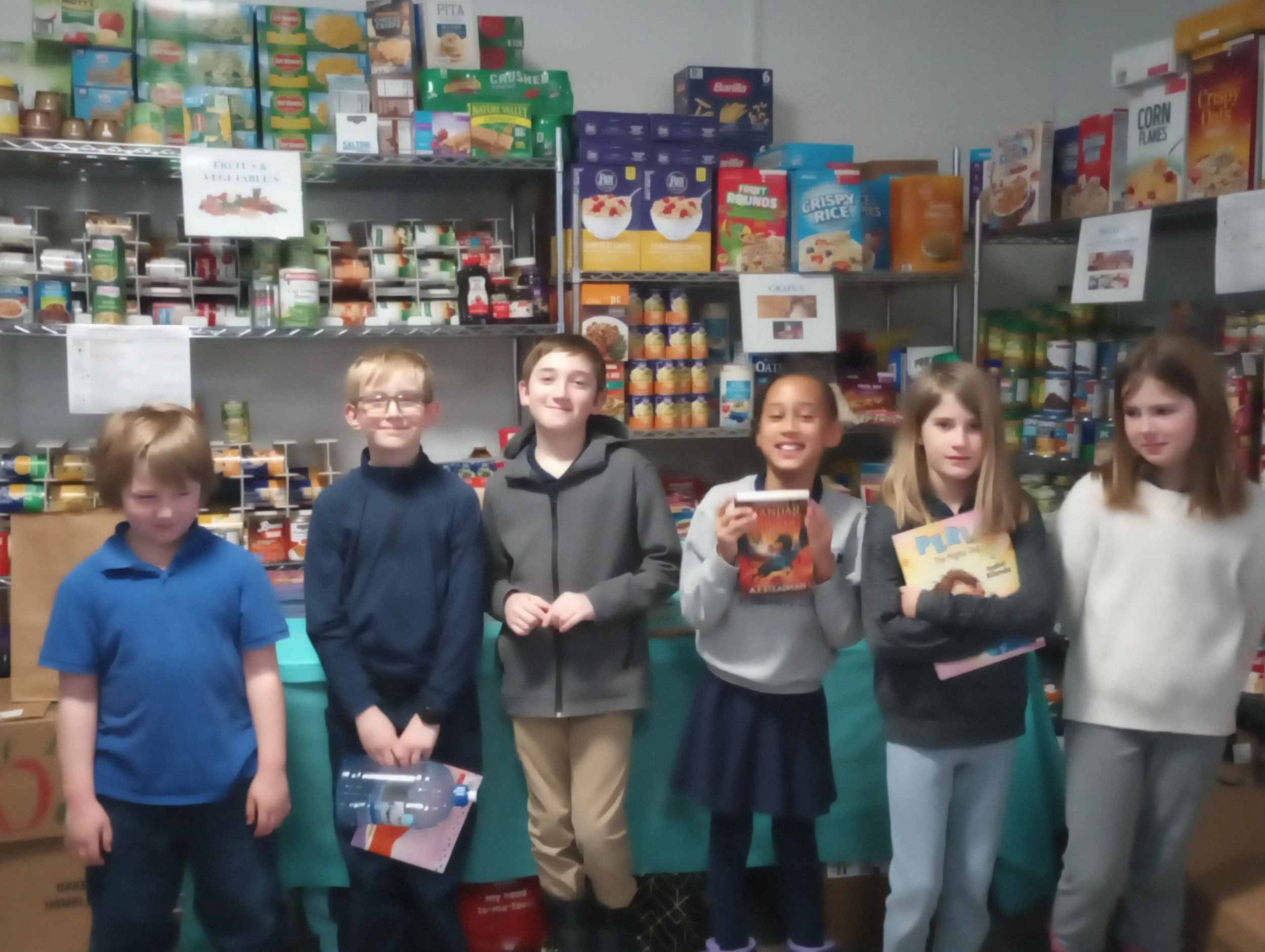 Students help stock food pantry at Saranac Lake
