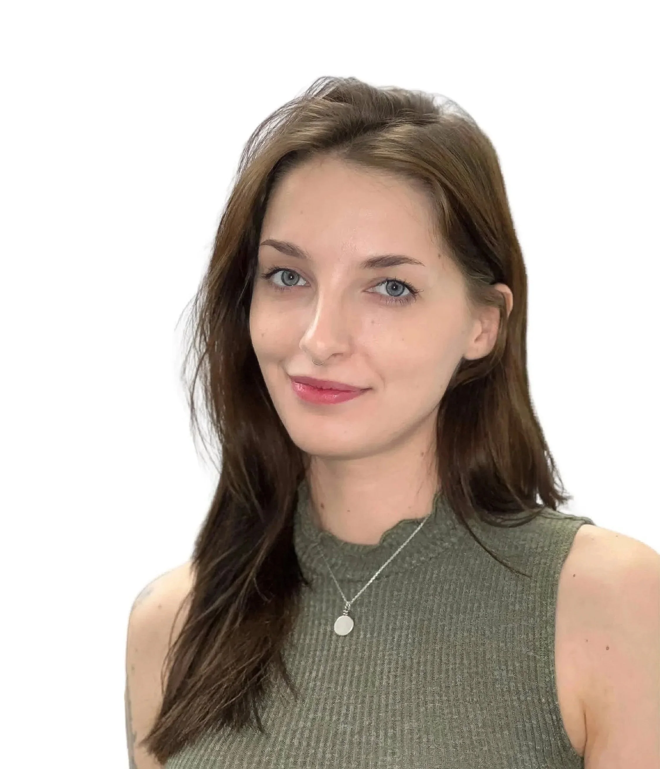 Portrait of a young woman with blue eyes, long brown hair, wearing a sleeveless green top and a silver necklace, smiling softly against a plain white background.