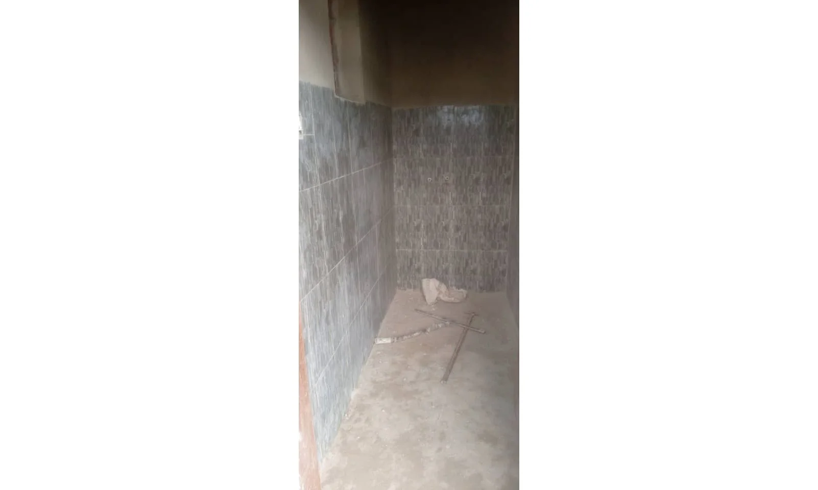 Interior tiles being installed. 