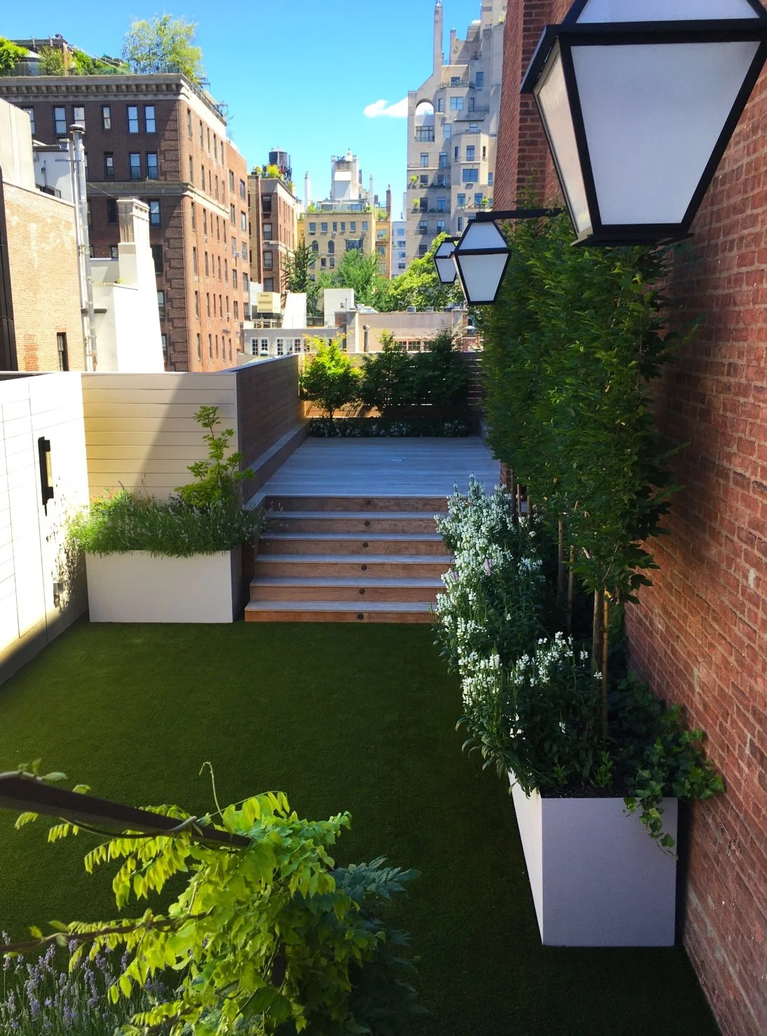 01_UPPER EAST SIDE ROOFTOP_espalier ipe stair.jpg