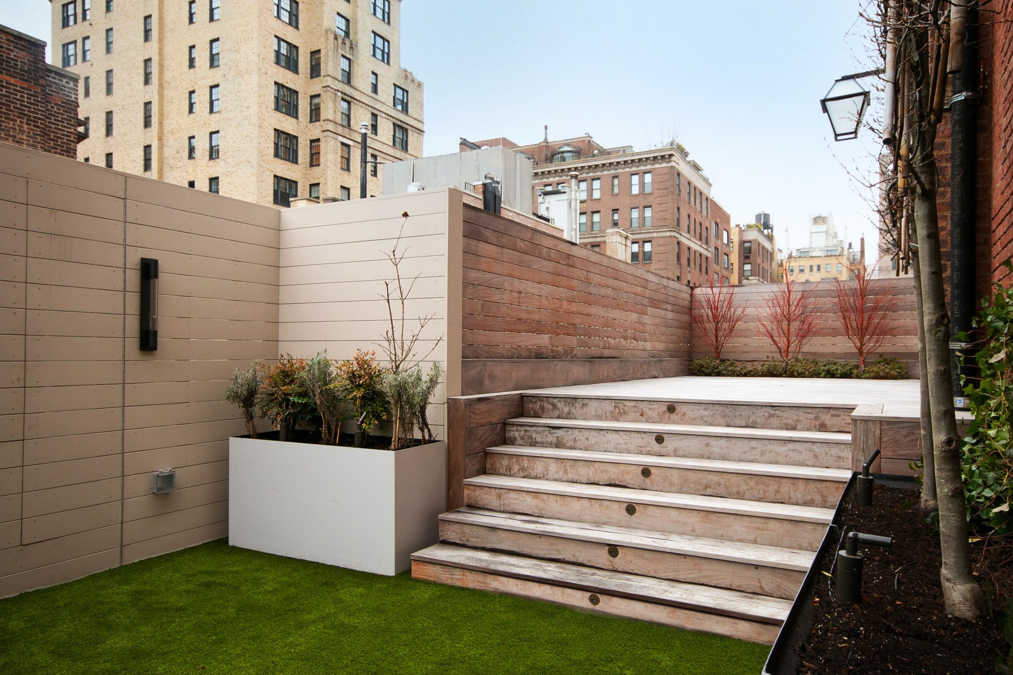 10_UPPER EAST SIDE ROOFTOP_espalier ipe stair winter.jpg
