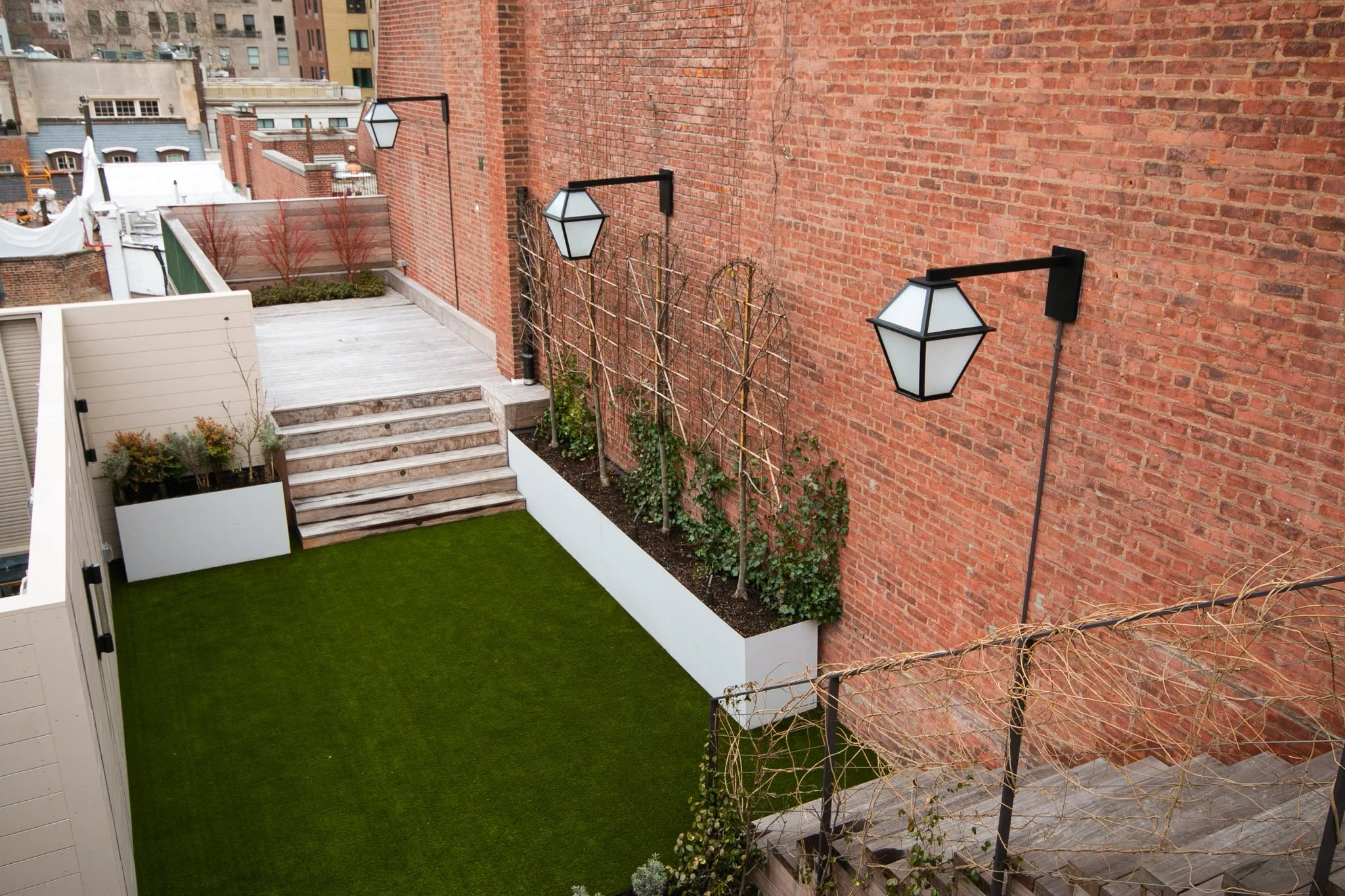 14_UPPER EAST SIDE ROOFTOP_espalier ipe stair winter.jpg