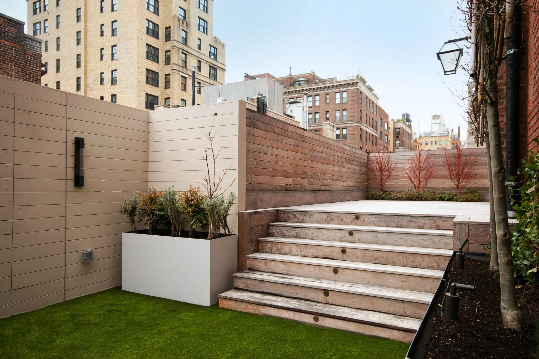 10_UPPER EAST SIDE ROOFTOP_espalier ipe stair winter.jpg