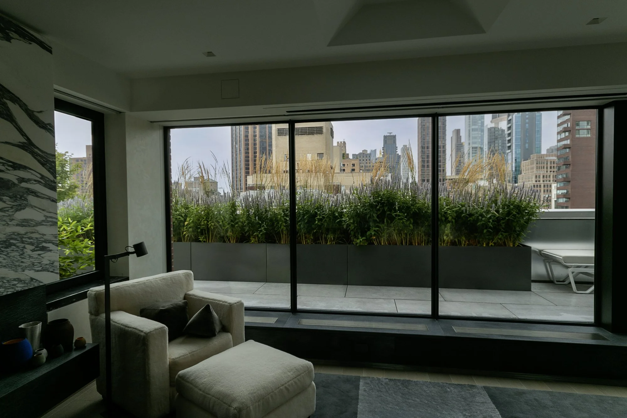 Parkave_penthouse_terrace_bedroomview_windwow_native_grasses.jpg