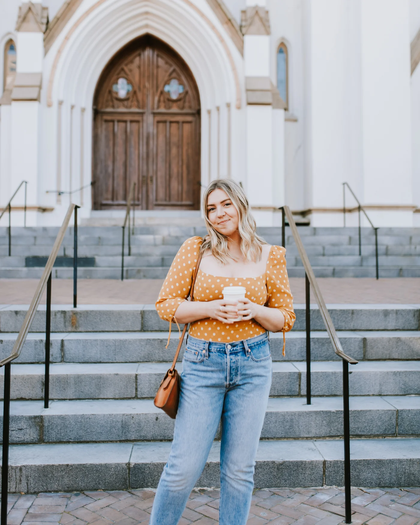 Outside of the Cathedral of St. John the Baptist // Top: Reformation , Jeans: Levi’s