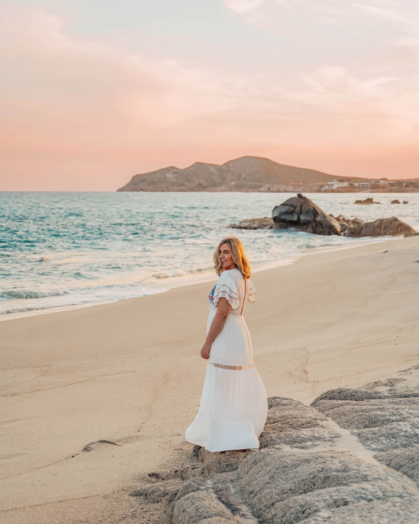 woman-beach-cabo-mexico-sunset-pink.jpg