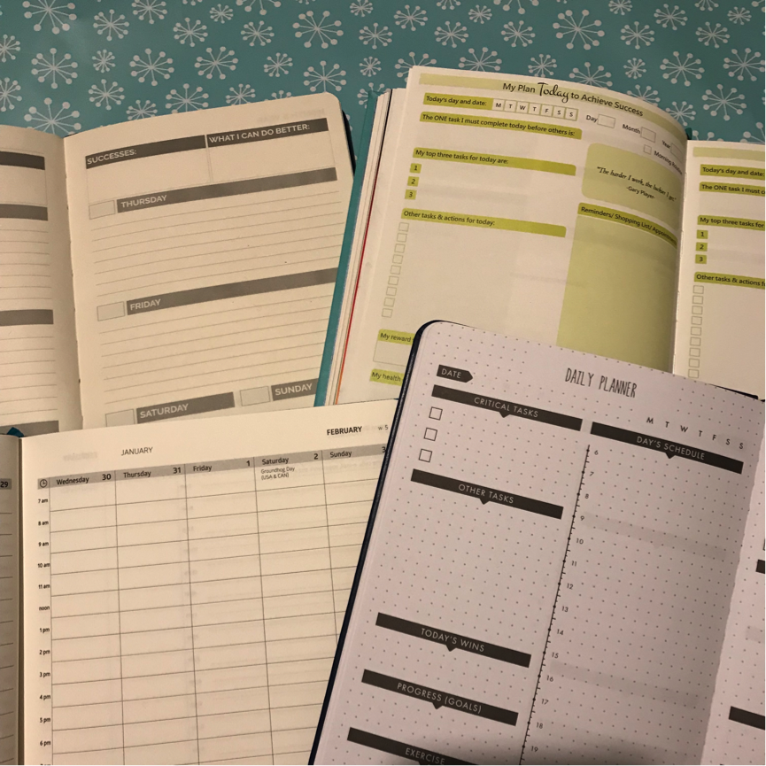 The journals I compared from top left clockwise; Simple Elephant, Inspire Now, Lux Productivity and Action Day.