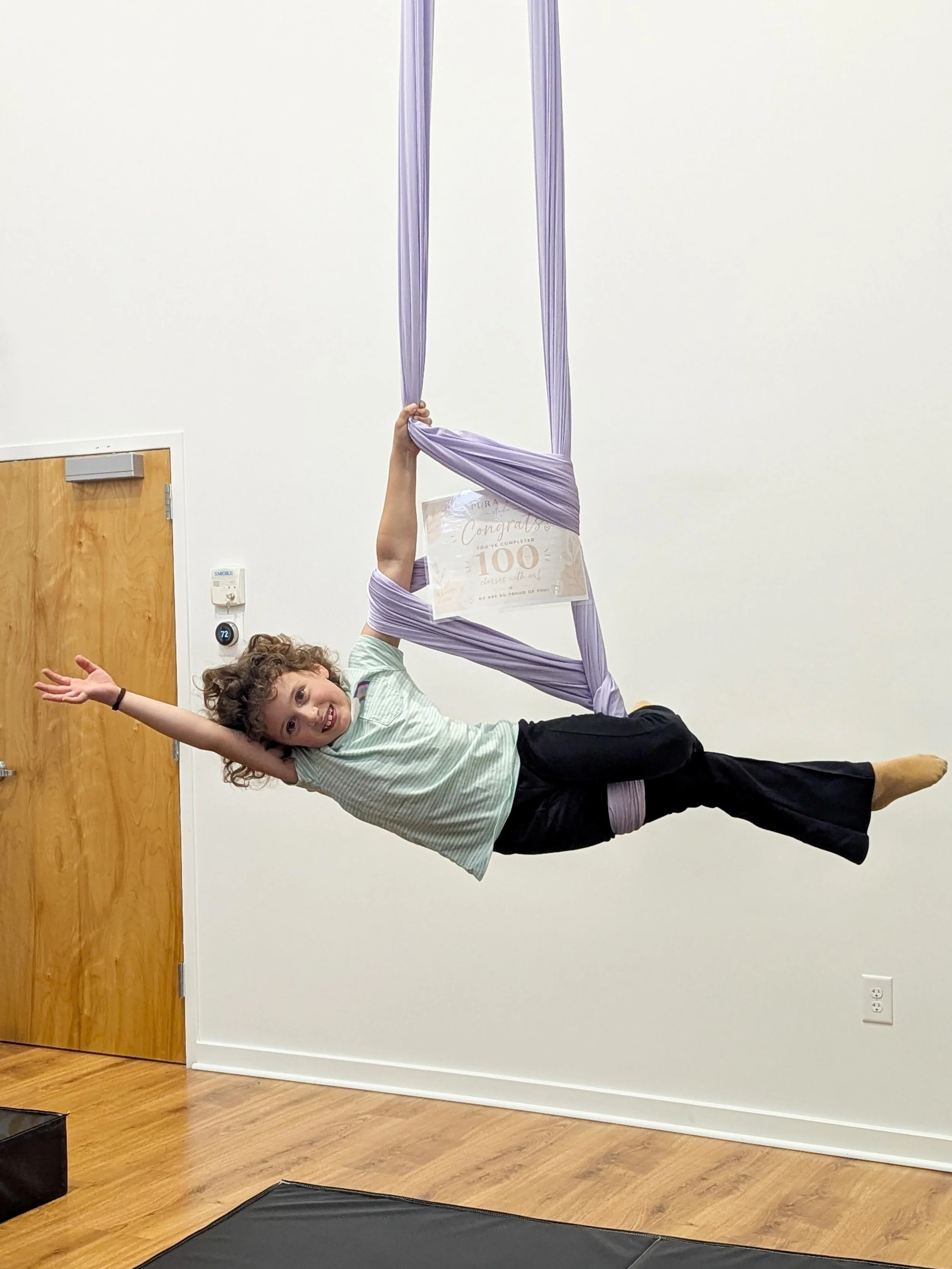 100 AERIAL CLASSES FOR EVELIA🎉

Help us celebrate our sweet student Evelia hitting 100 aerial classes with us at Pura Vida Studio!

Evelia has been part of our kids aerial program (ages 5&ndash;8) for the last two years, and it has been so special w