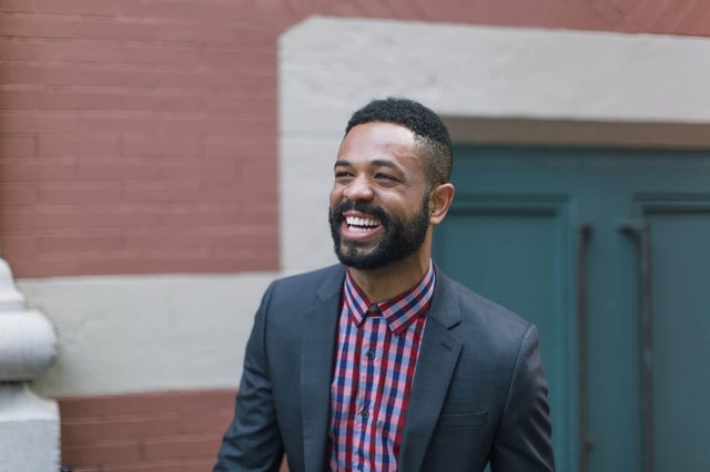 smiling-oxford-shirt-and-suit-min.jpeg