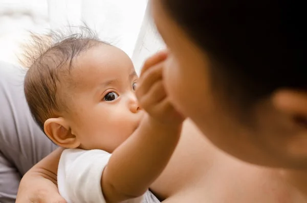 MIKONOWICZ-Mother-Breastfeeding-Newborn-min (2).jpg