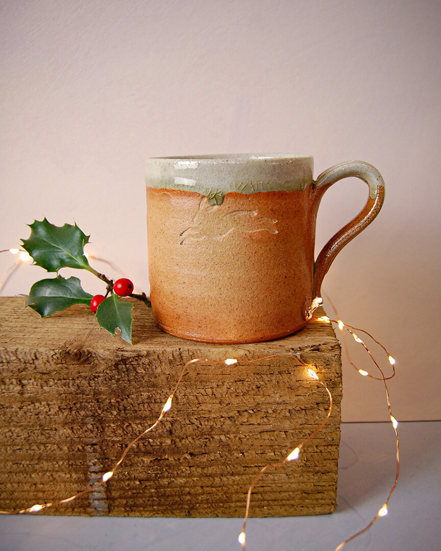 Leaping hares mug
