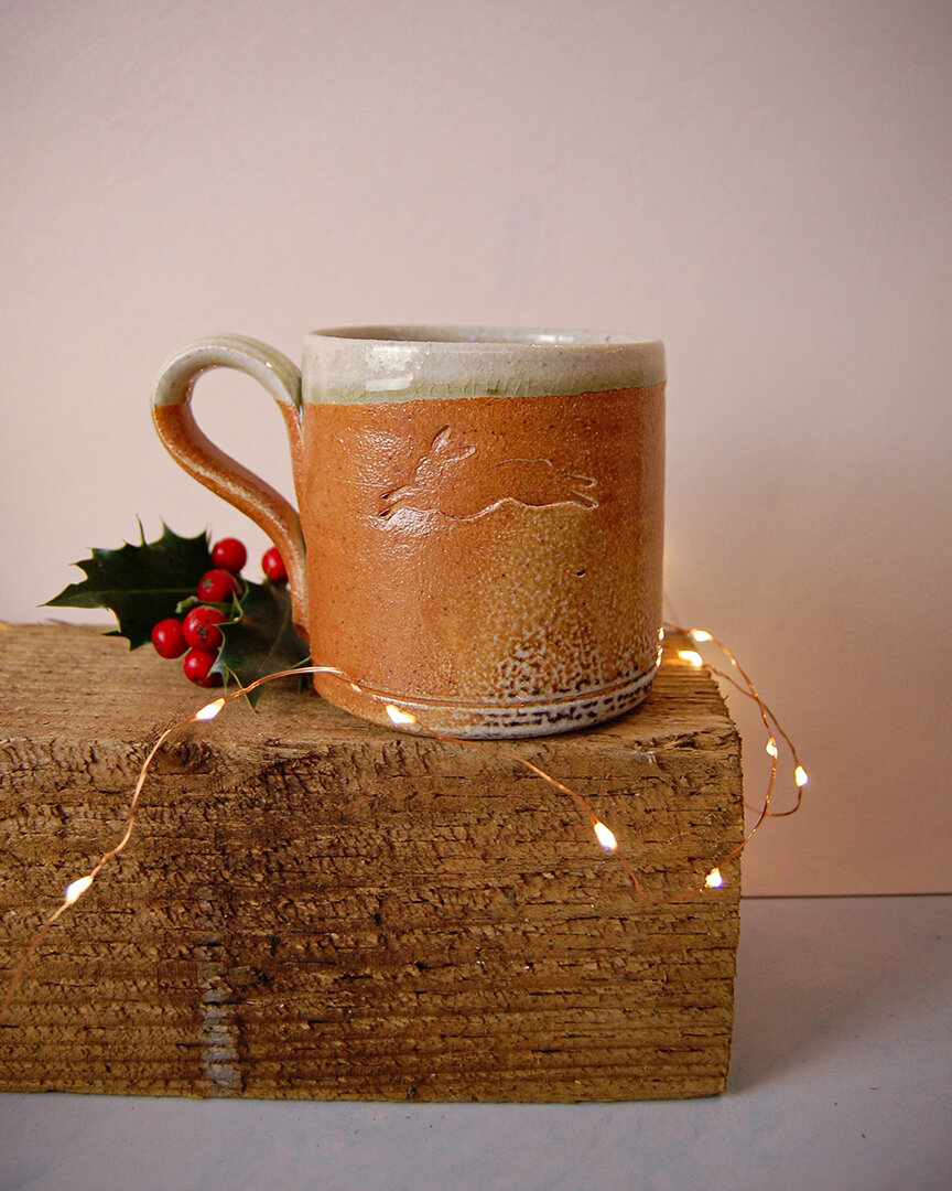 Leaping hares mug