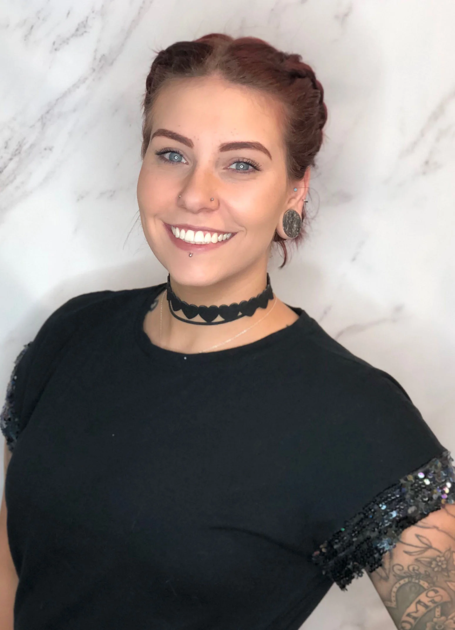 Kendi knows curls, which she loves to top off with color enhancing balayage and a shadow base. She fears no blonde or pixie cut and believes a brow wax can completely transform your self-esteem.
