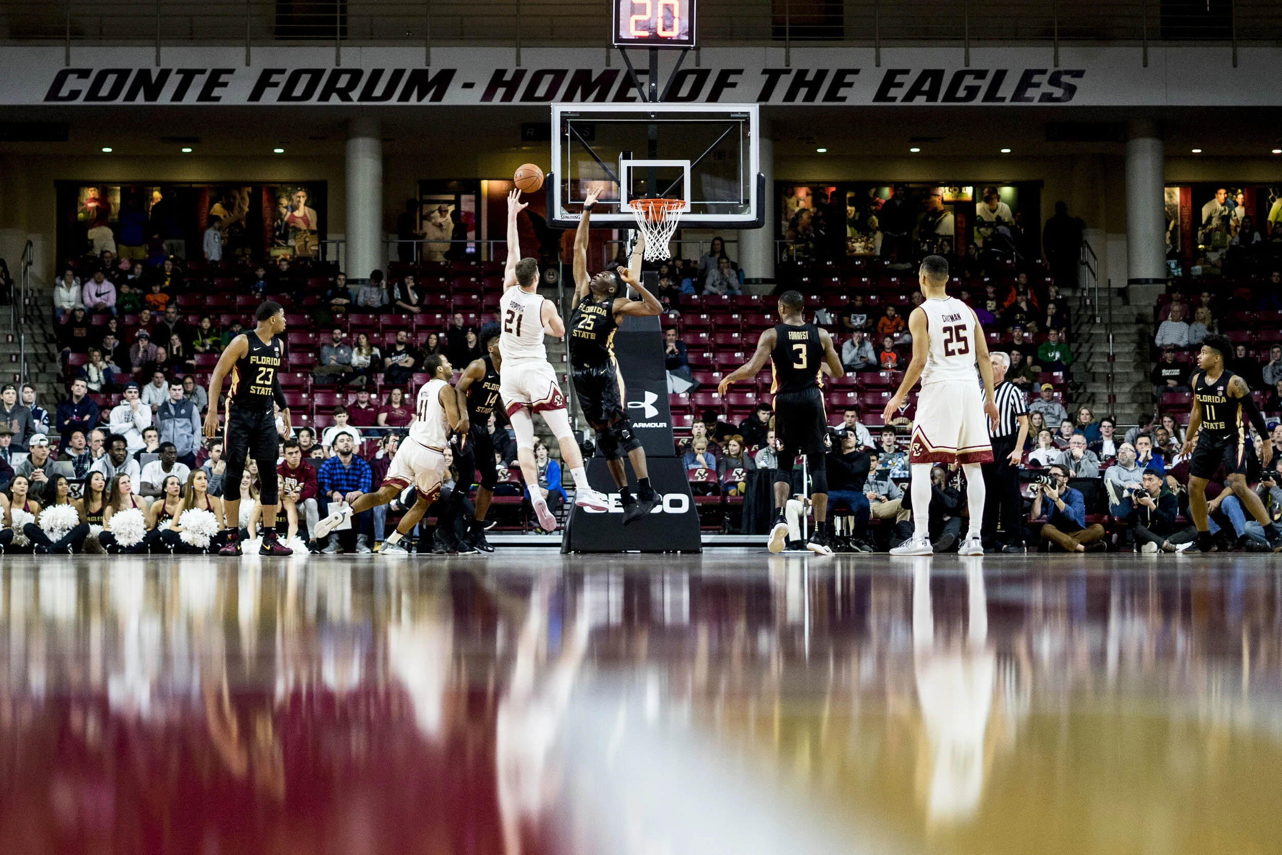 Forward Nik Popovik, of Boston College Men’s Basketball, is blocked by Mfiondu Kabengele, of Florida State University at Conte Forum in Newton, MA.