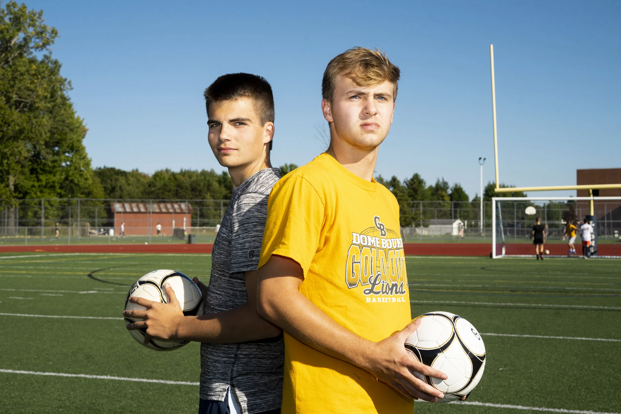  David Jenner, left, and Nick Lennox, right, of General Brown High School Soccer pose for a portrait before practice in Dexter.  