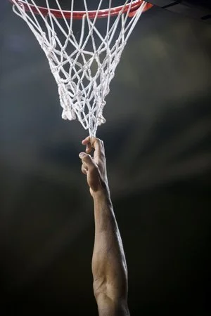  A Florida State player hangs on the net during pregame warmups in the game against Boston College at Conte Forum in Newton, MA. 