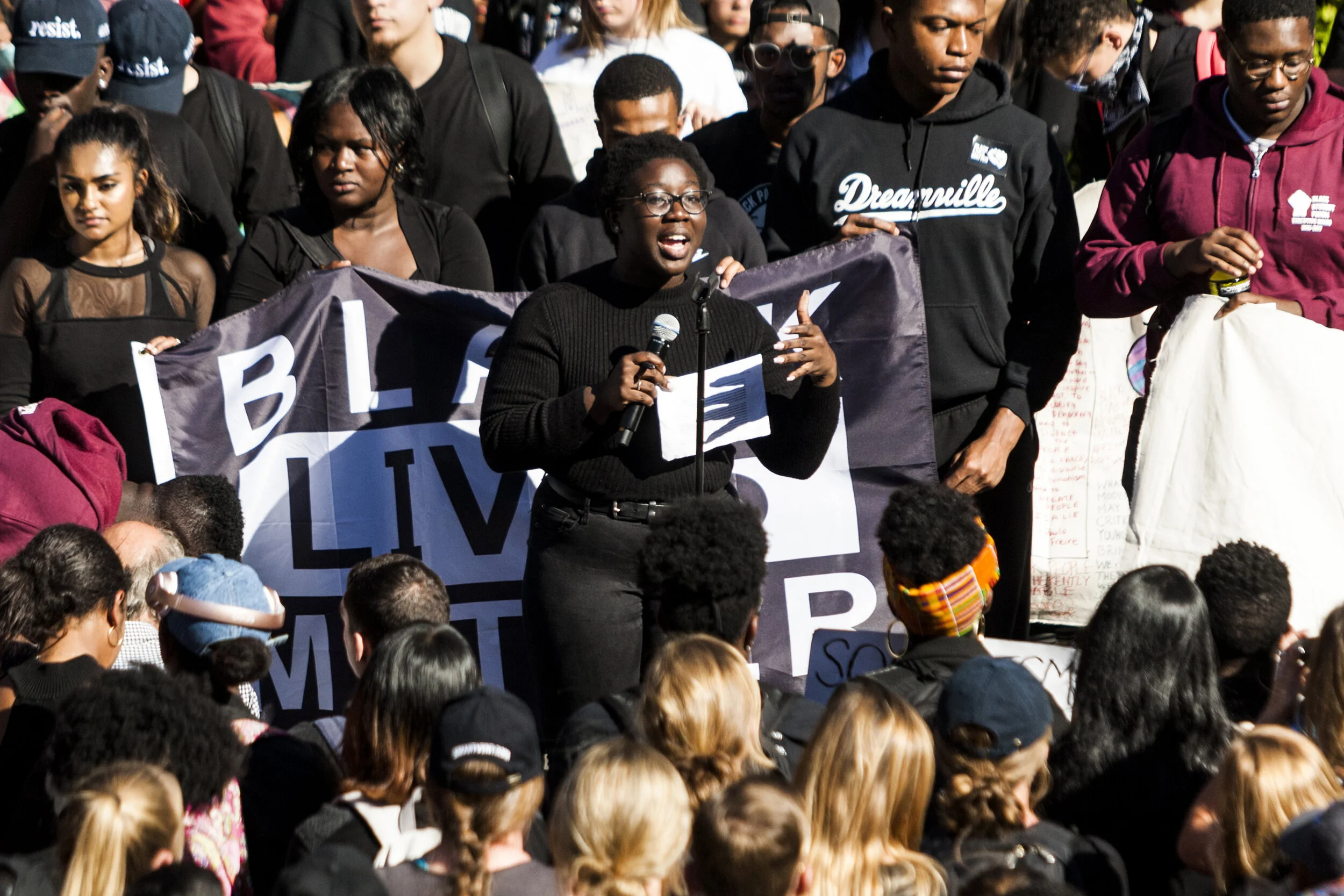  Akosua Achampong, UGBC president and MCAS ’18, makes demands of the Boston College administration at the Silence is Still Violence march held in protest of a series of racially motivated hate crimes that took place on campus in 2017. 