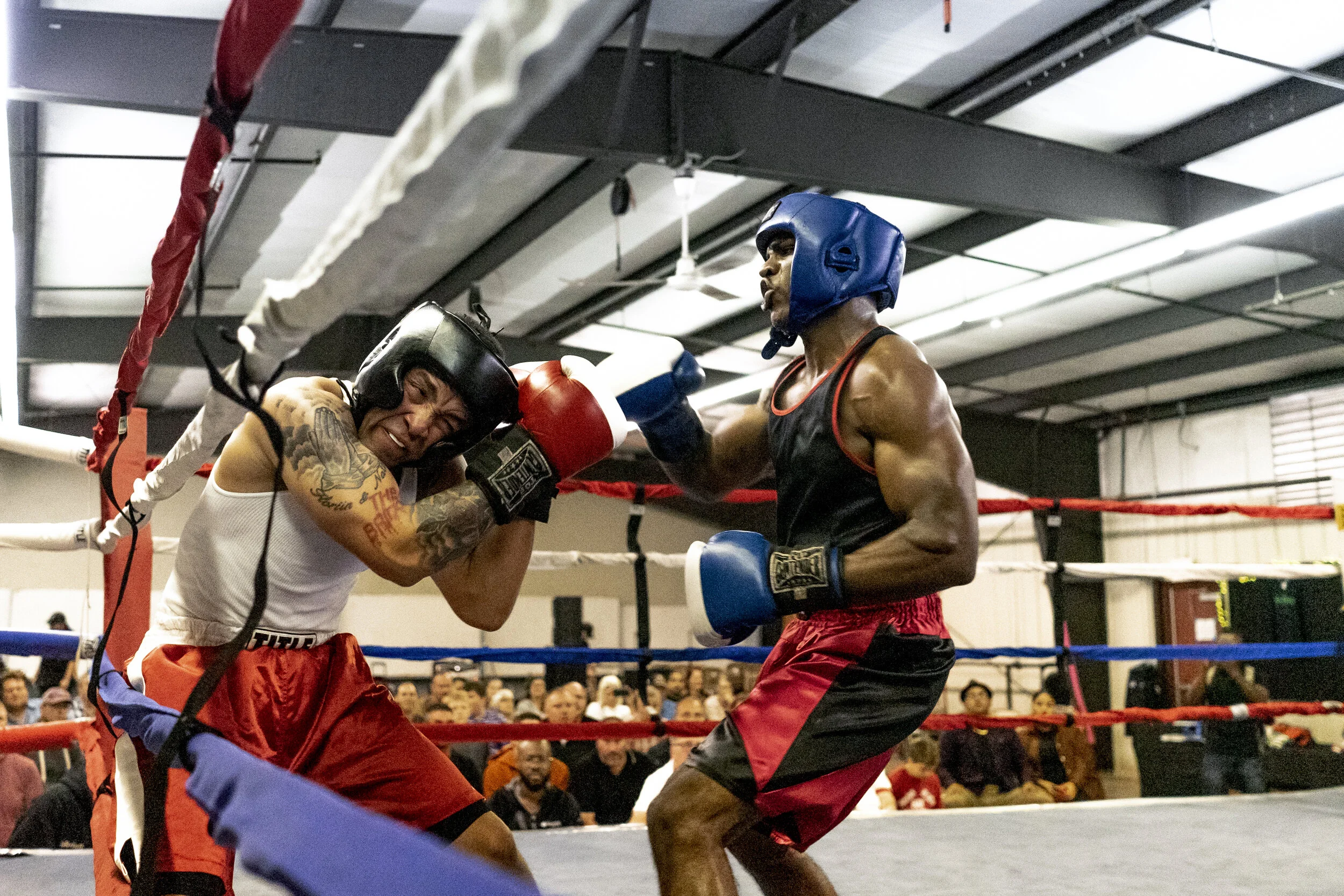  Malcom Bynnum, of Syracuse, pummels opponent Matteo Dasterri, of Watertown, at the 11th annual Carmen Basilio Quest for Champions event in Watertown, NY. 