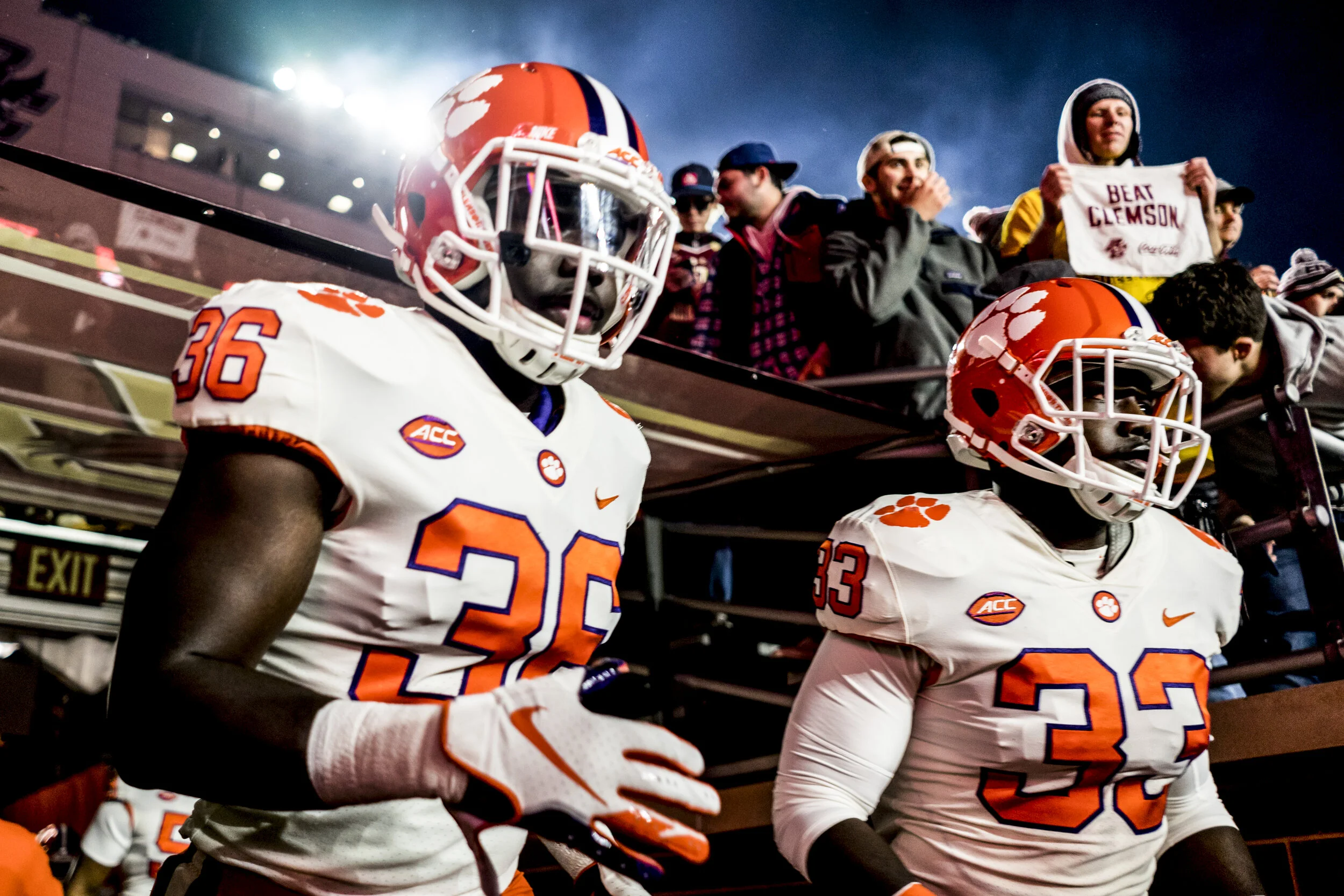  Members of the Clemson Tigers football team rush into Alumni Stadium to face Boston College on November 11, 2018 in Chestnut Hill, MA. 