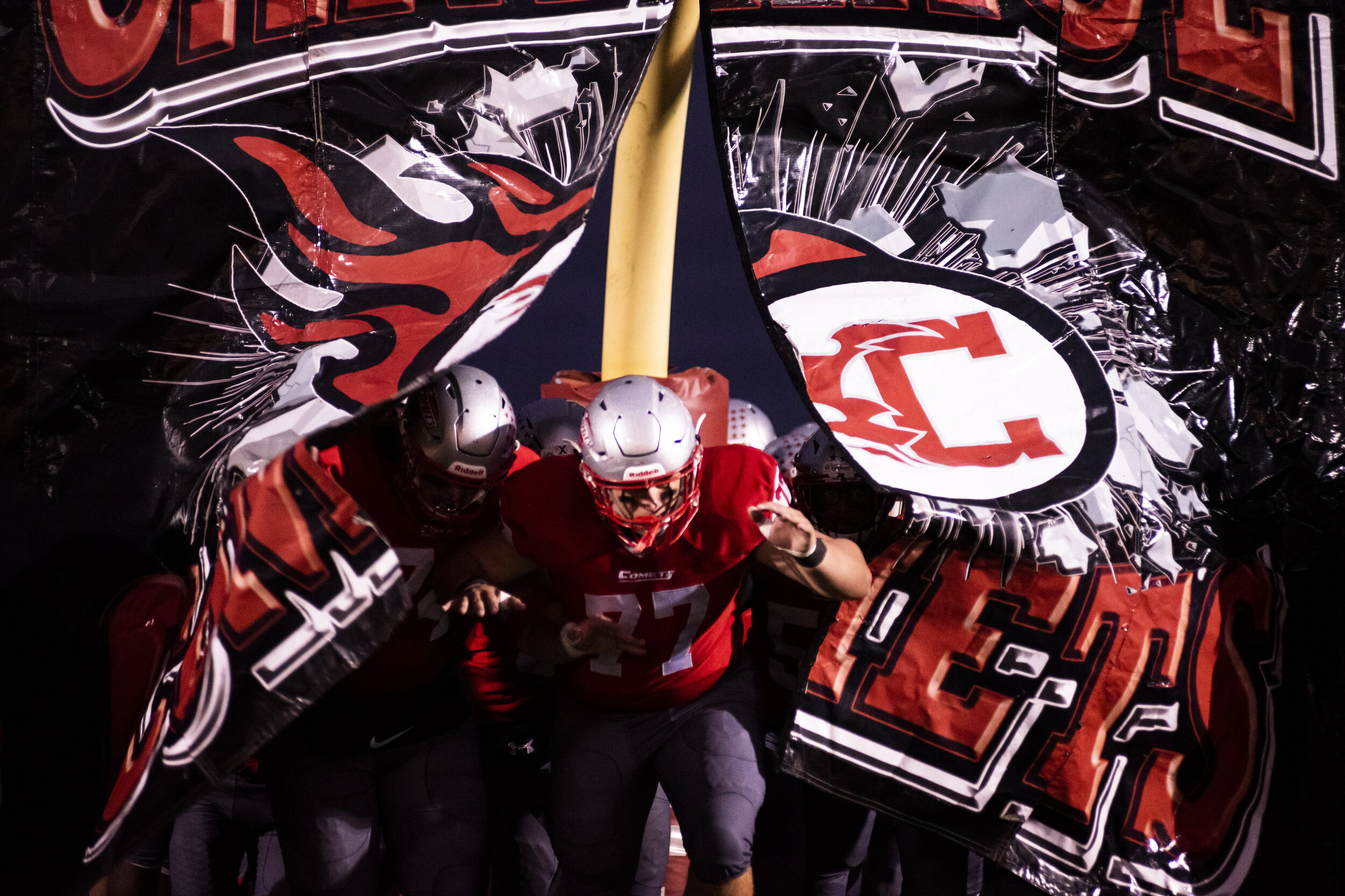 Carthage Football bursts through the banner to enter the field to face Indian River at home in Carthage, N.Y. on October 4, 2020. 