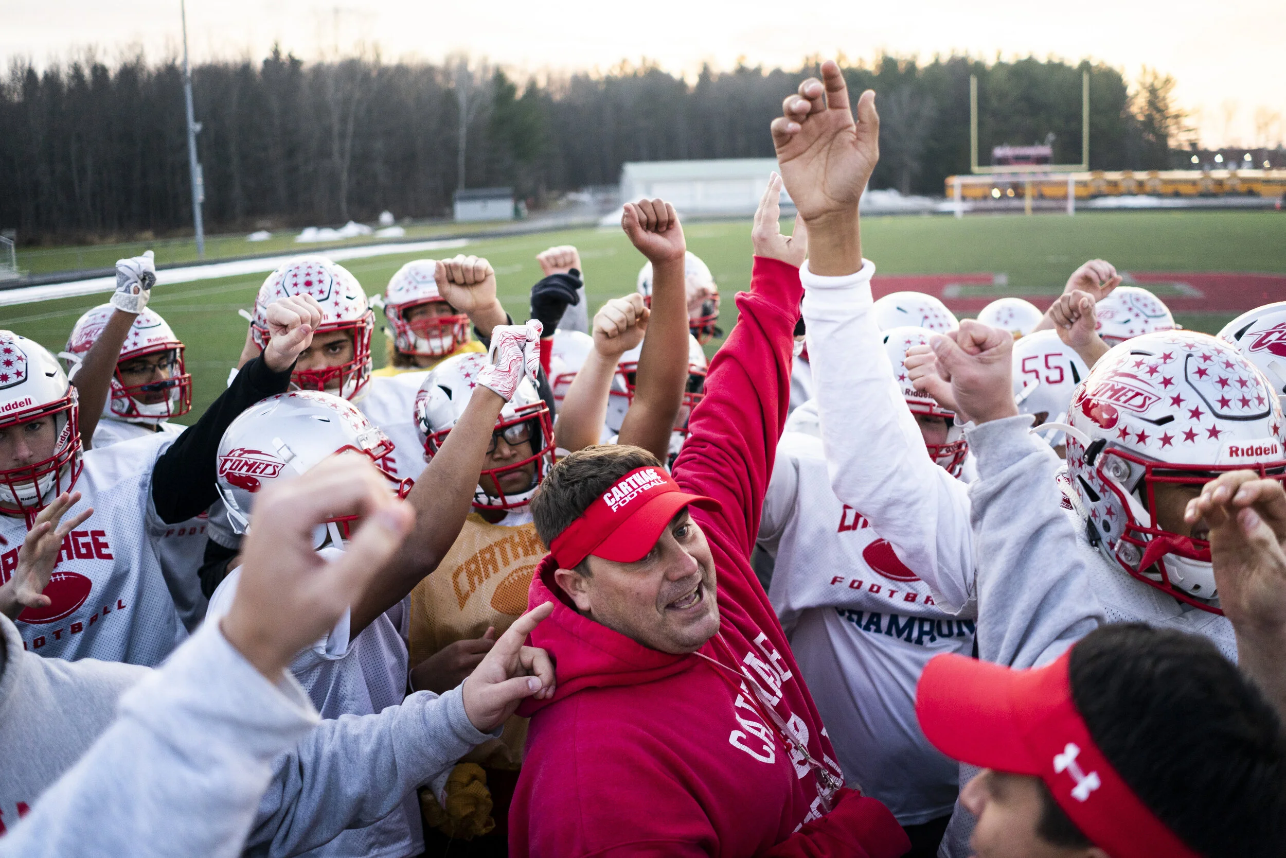  The Comets rally around head coach Jason Coffman at the final practice before the state championship game. 