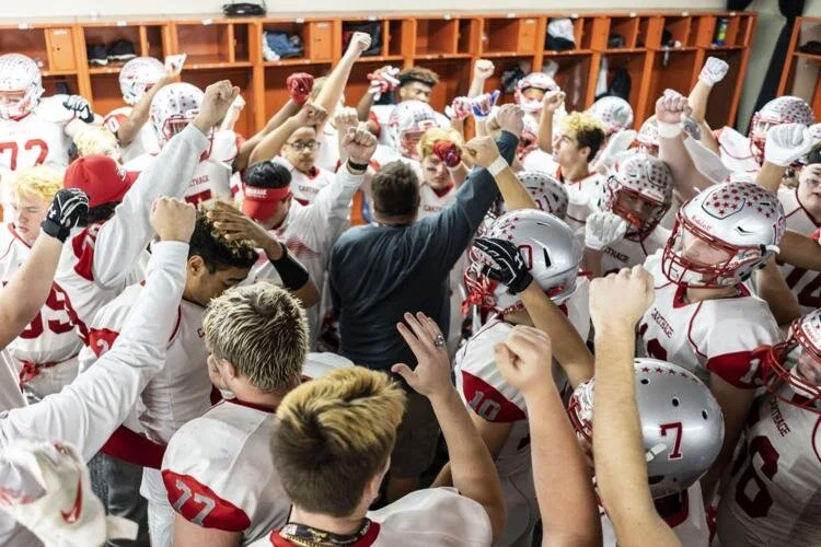  The Carthage Comets give one last cheer before returning to the field after halftime of the state Class A final at the Carrier Dome in Syracuse, NY.  