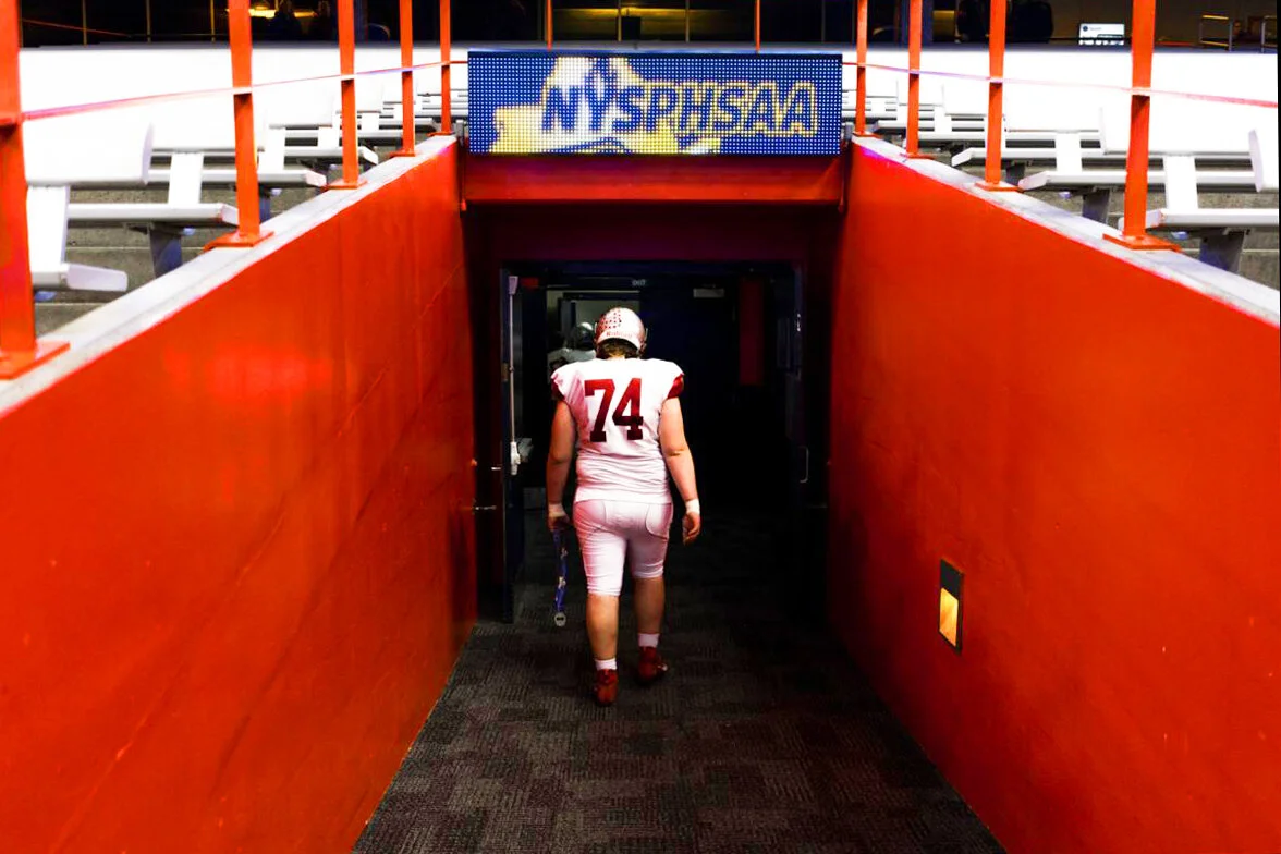  Gaige Horton is the last to return to the locker room after the devastating loss to Cornwall in the state championship final. 