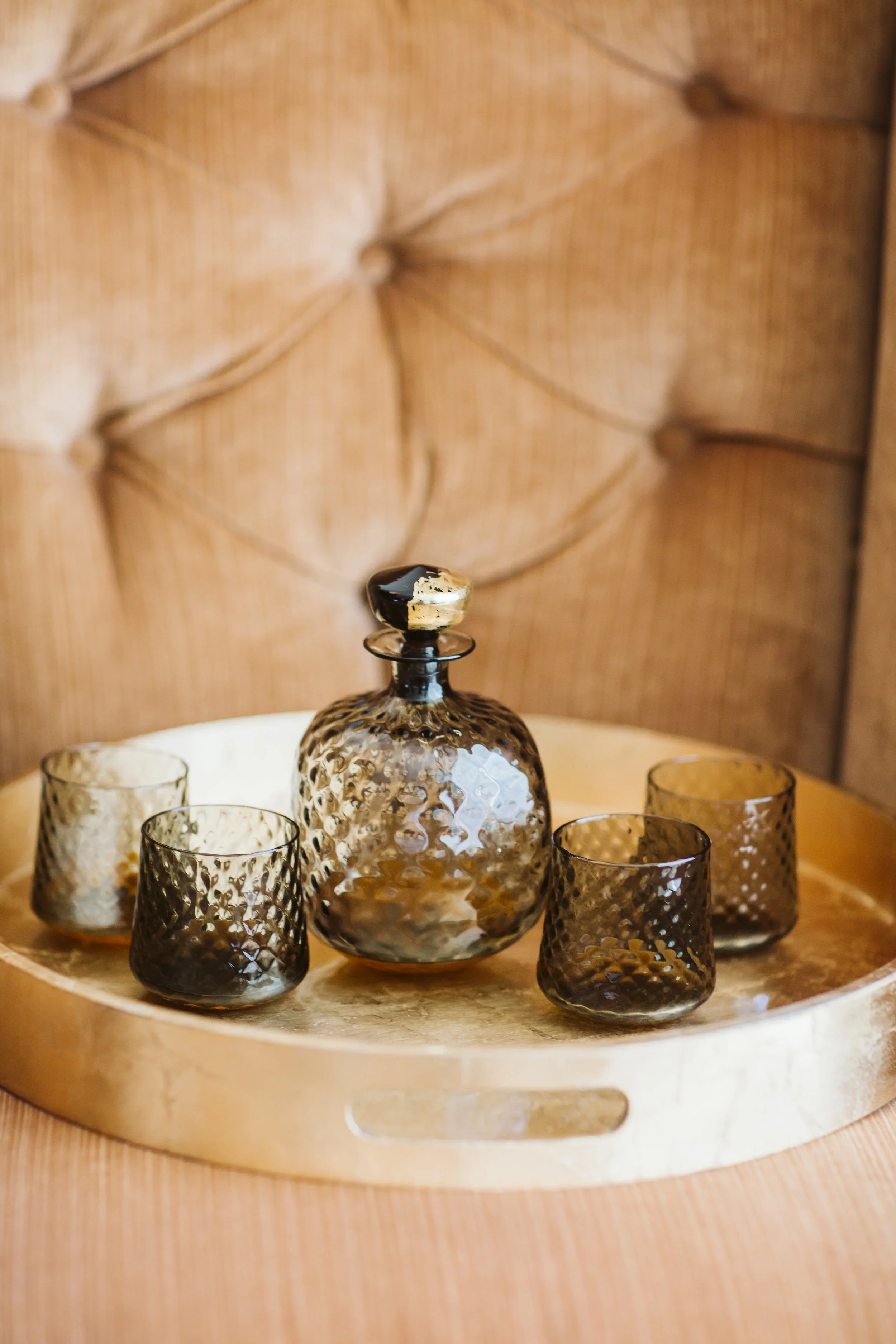  The groomsmen each received a whiskey decanter and glass set by Decicio Glass from Seattle, where Robert had his bachelor party. 