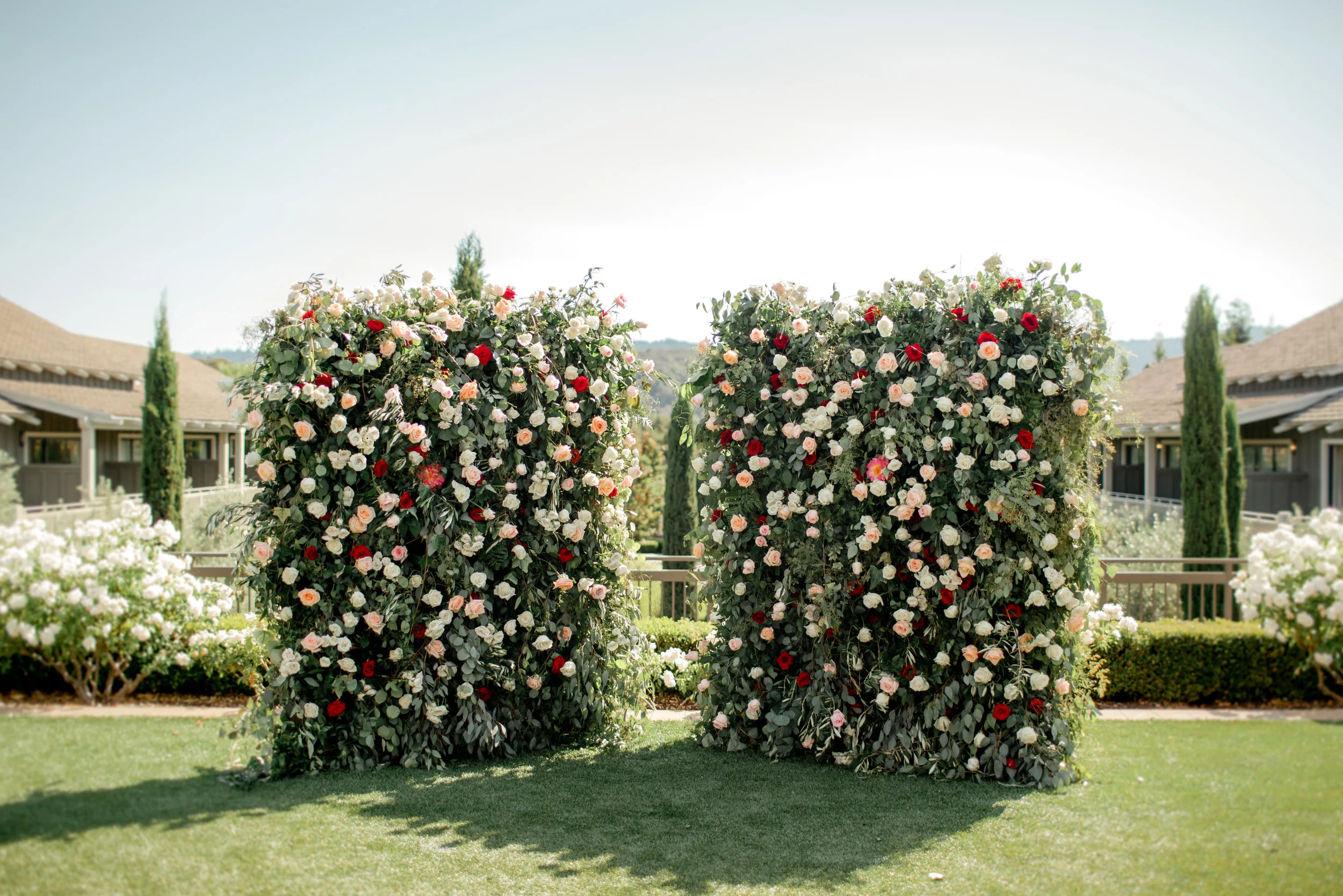  In the flower walls and bouquets were peonies, a Chinese symbol of love; and olive branches, a symbol of peace and the namesake of their puppy, Olive. 