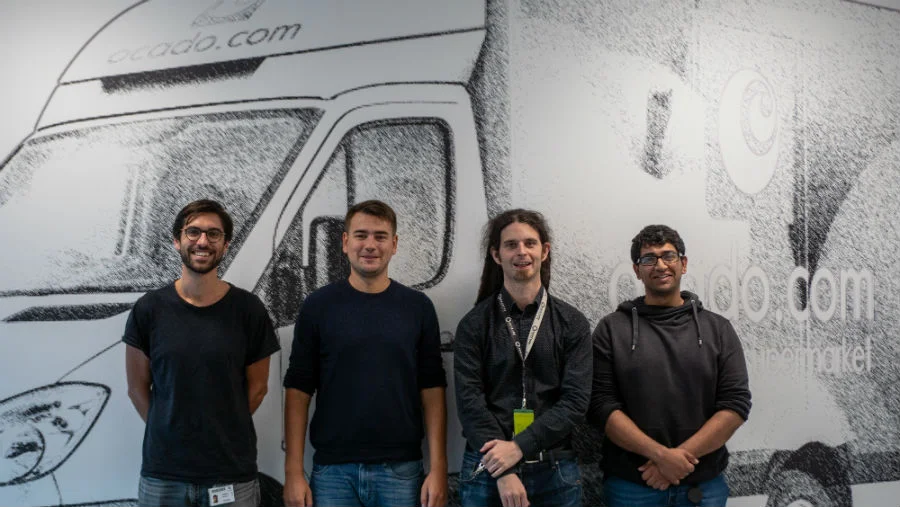 Daniel (third from left) and team