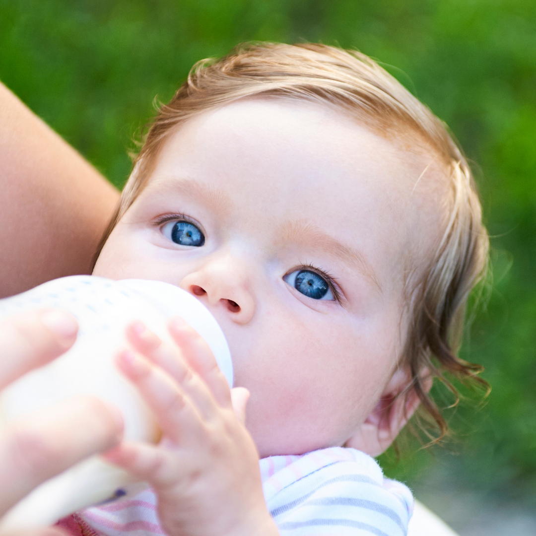 Toddler Drinking Milk Bottle