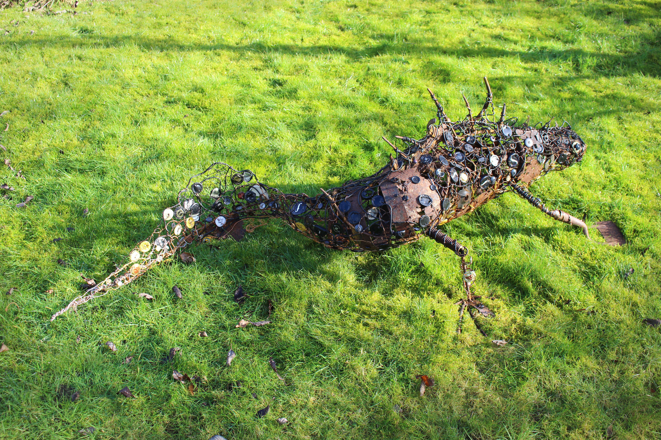 Great Crested Newt 168x90x46cms, recycled metal, bottletops, buttons & beads, Carymoor '19.jpg