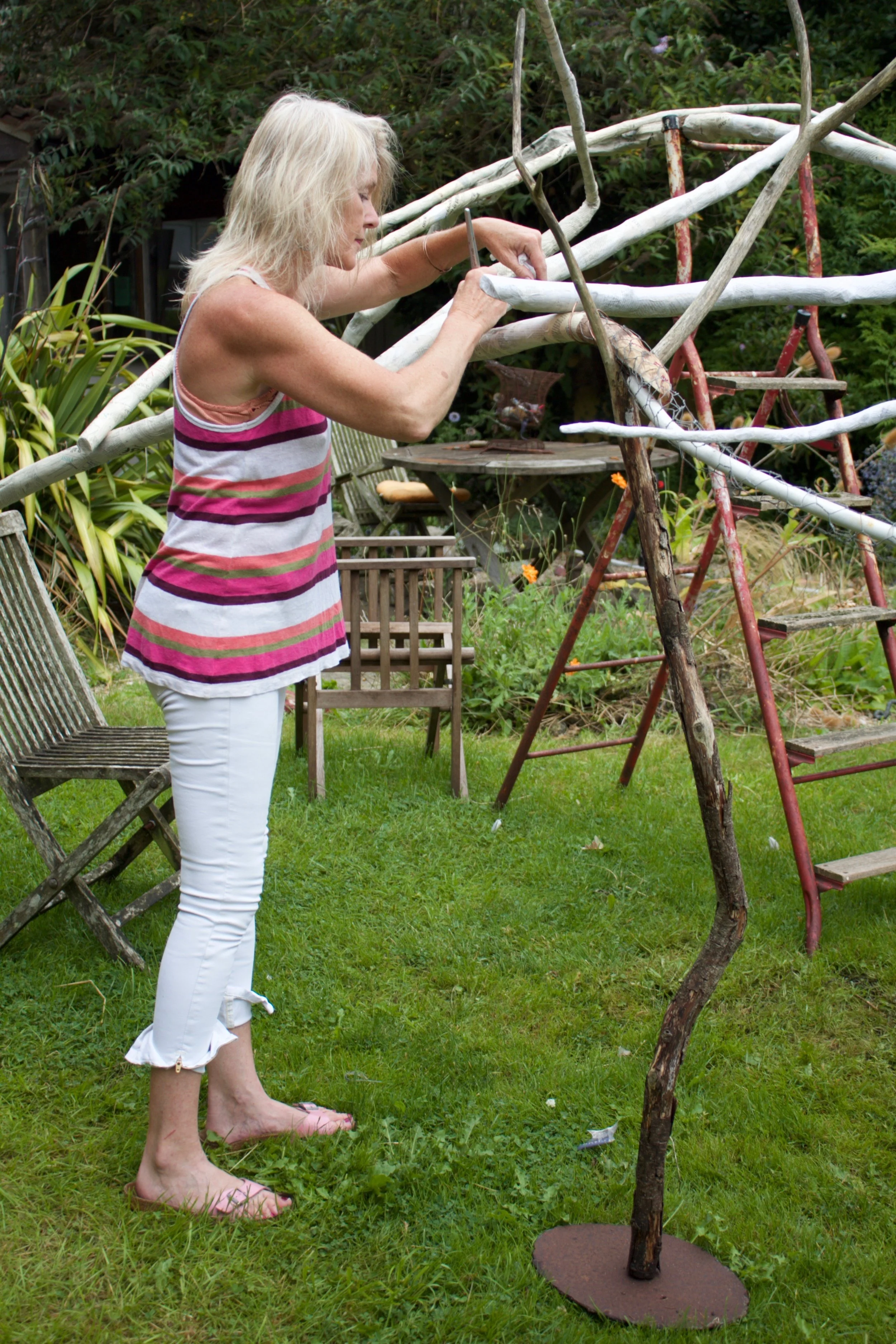 Fiona Campbell (co-curator:artist) working on her giant ladder. Photo by Jason King.jpeg