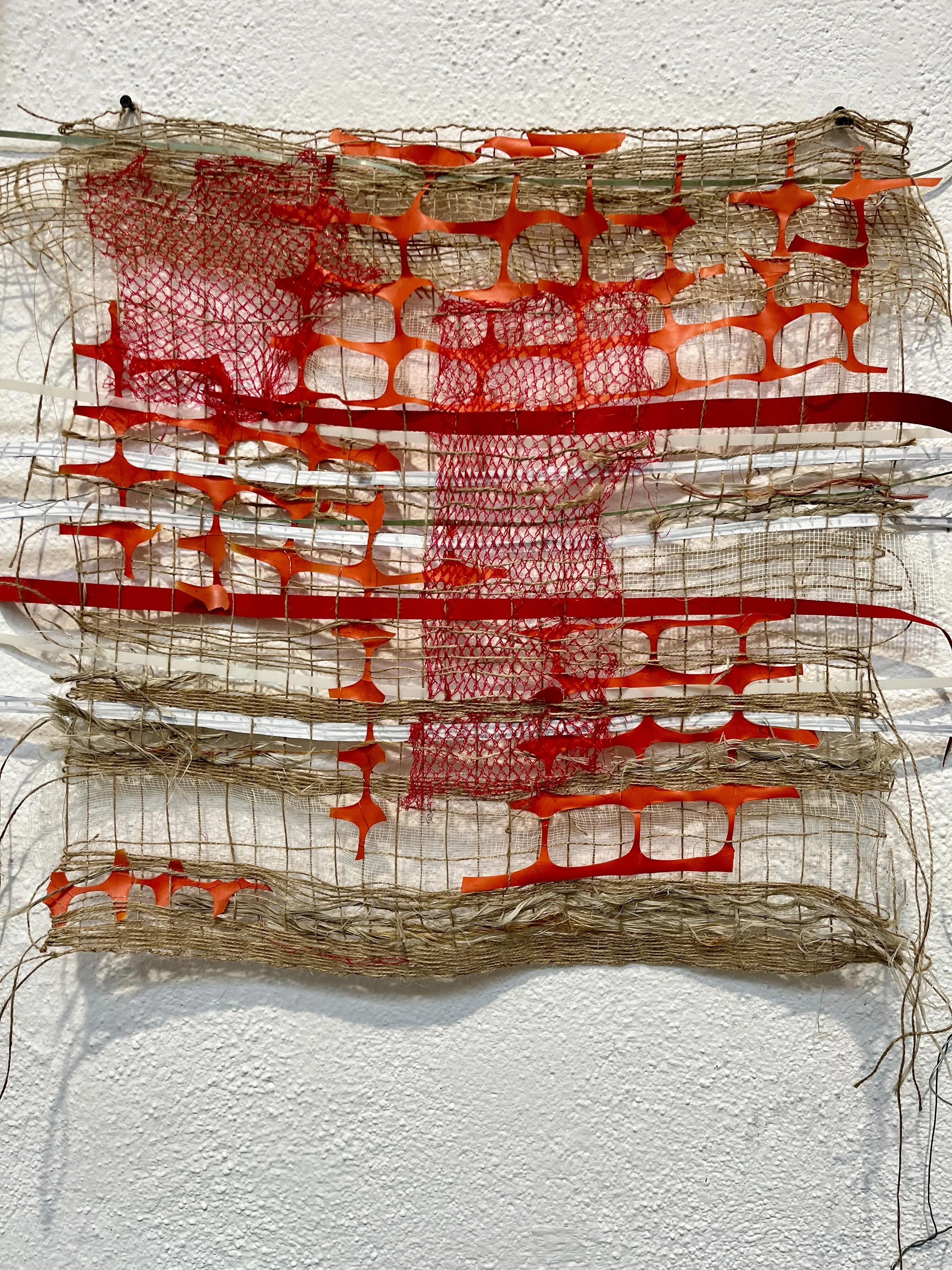  Work in progress. weaving of found debris from the wasteland. One section of the many hand-stitched patches incorporated into Sack. 