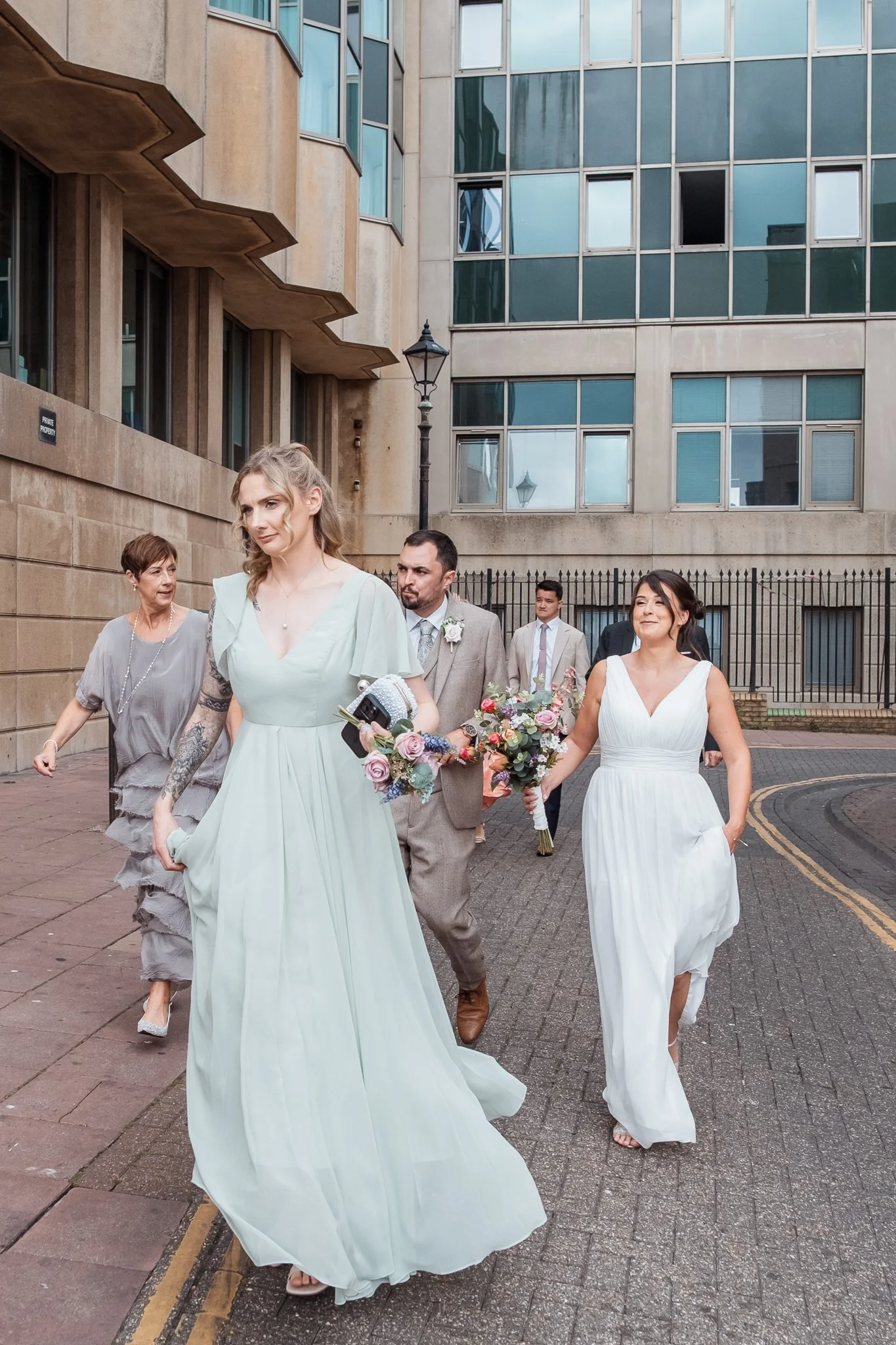 Wedding Party walking through the streets of Brighton