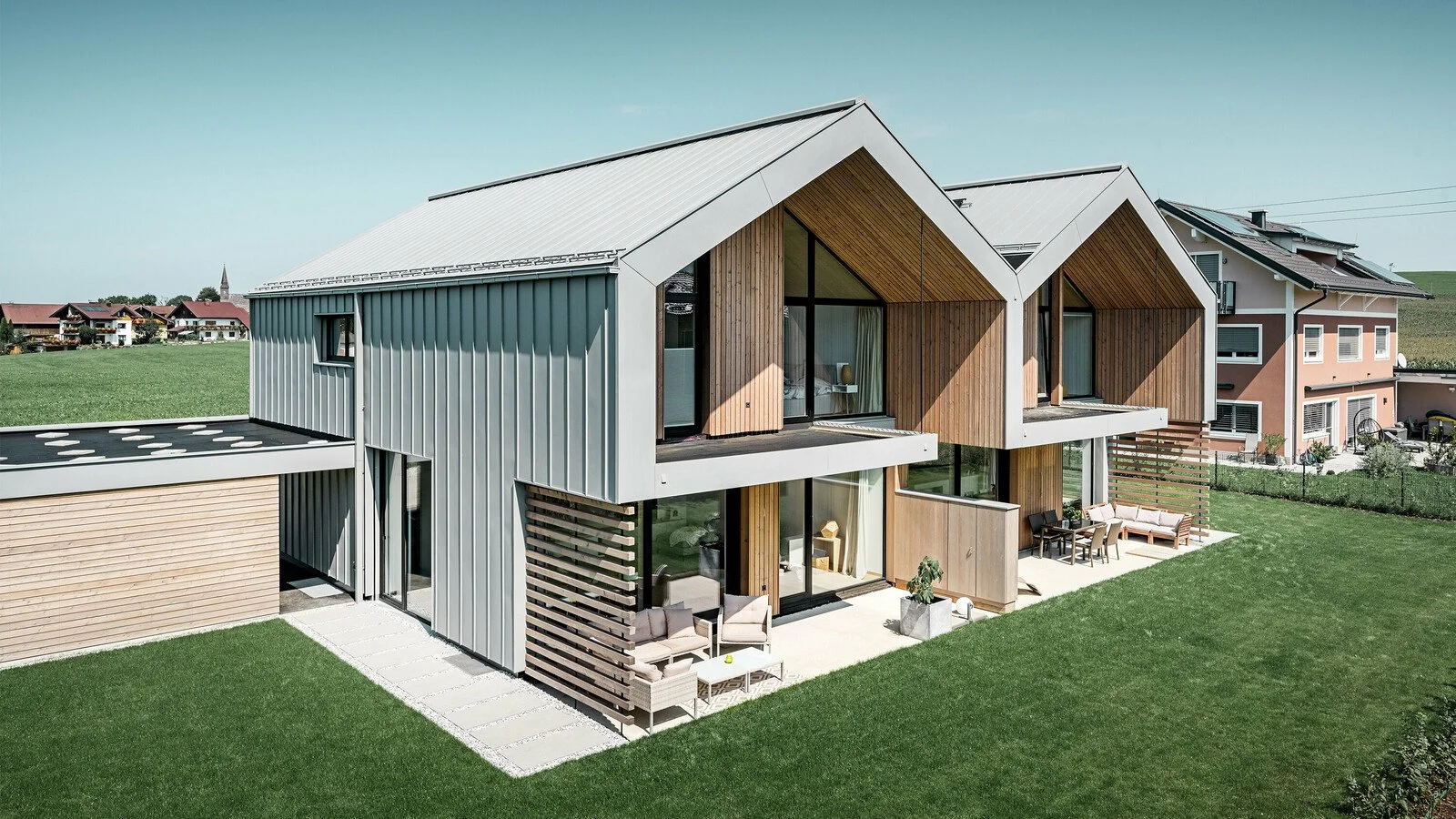 csm_PREFA-EFH-Goeming-Prefalz-patinagrau-Doppelhaus_e9d7d6beb4.jpg