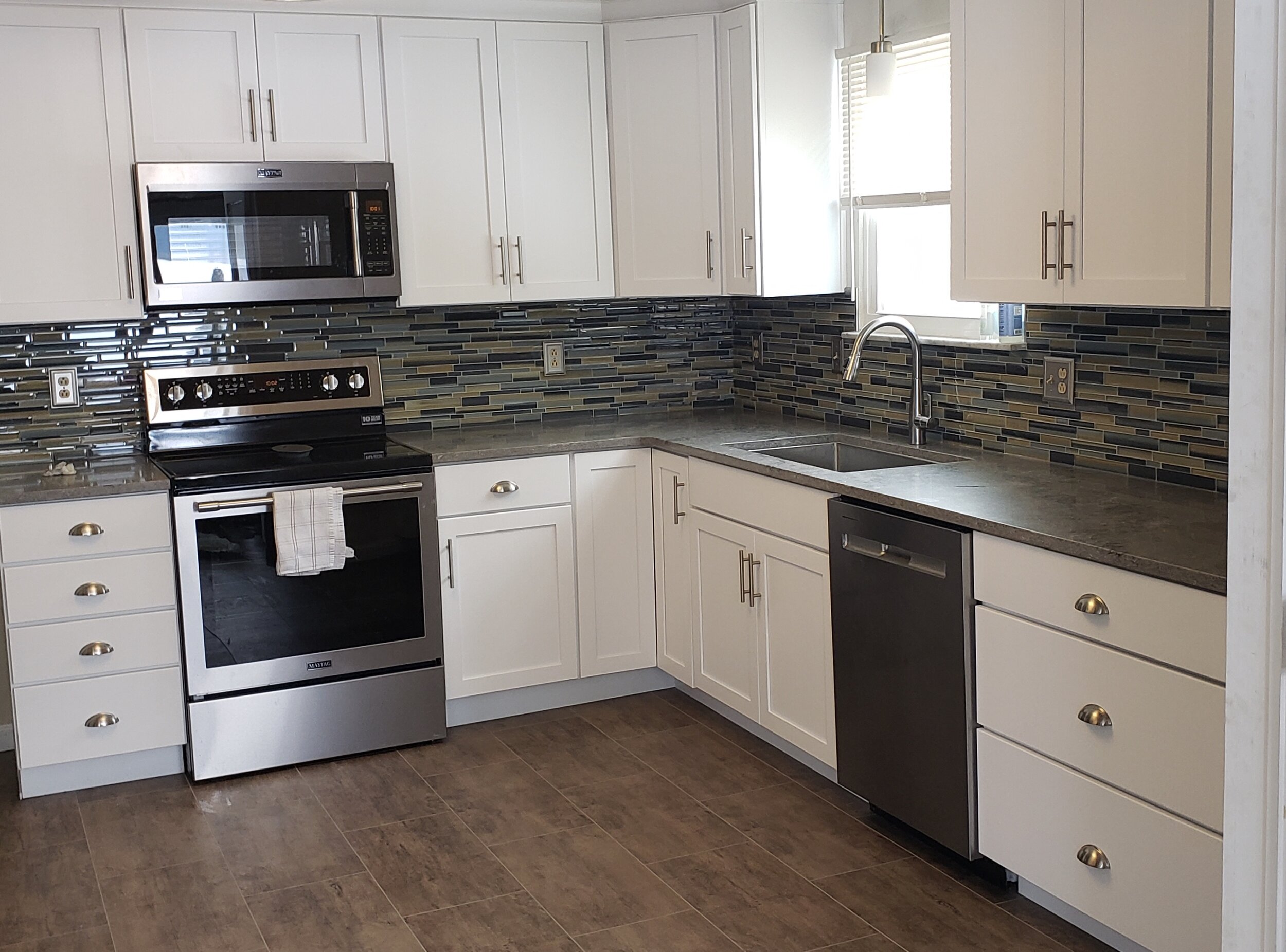 Contemporary Kitchen Remodel by Home Improvement Center project photo