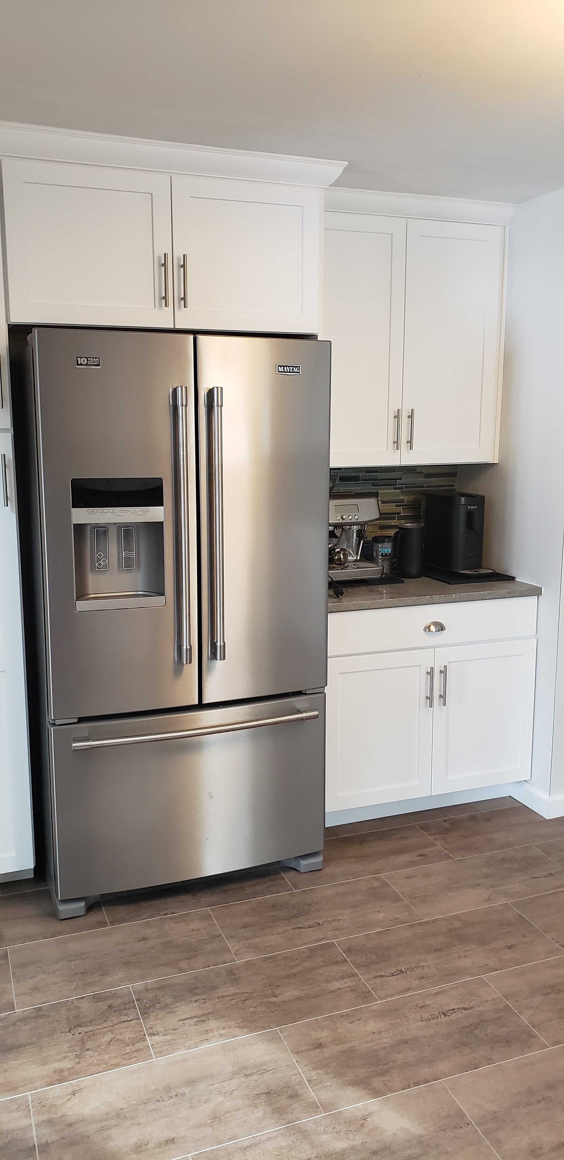 Contemporary Kitchen Remodel by Home Improvement Center project photo 2